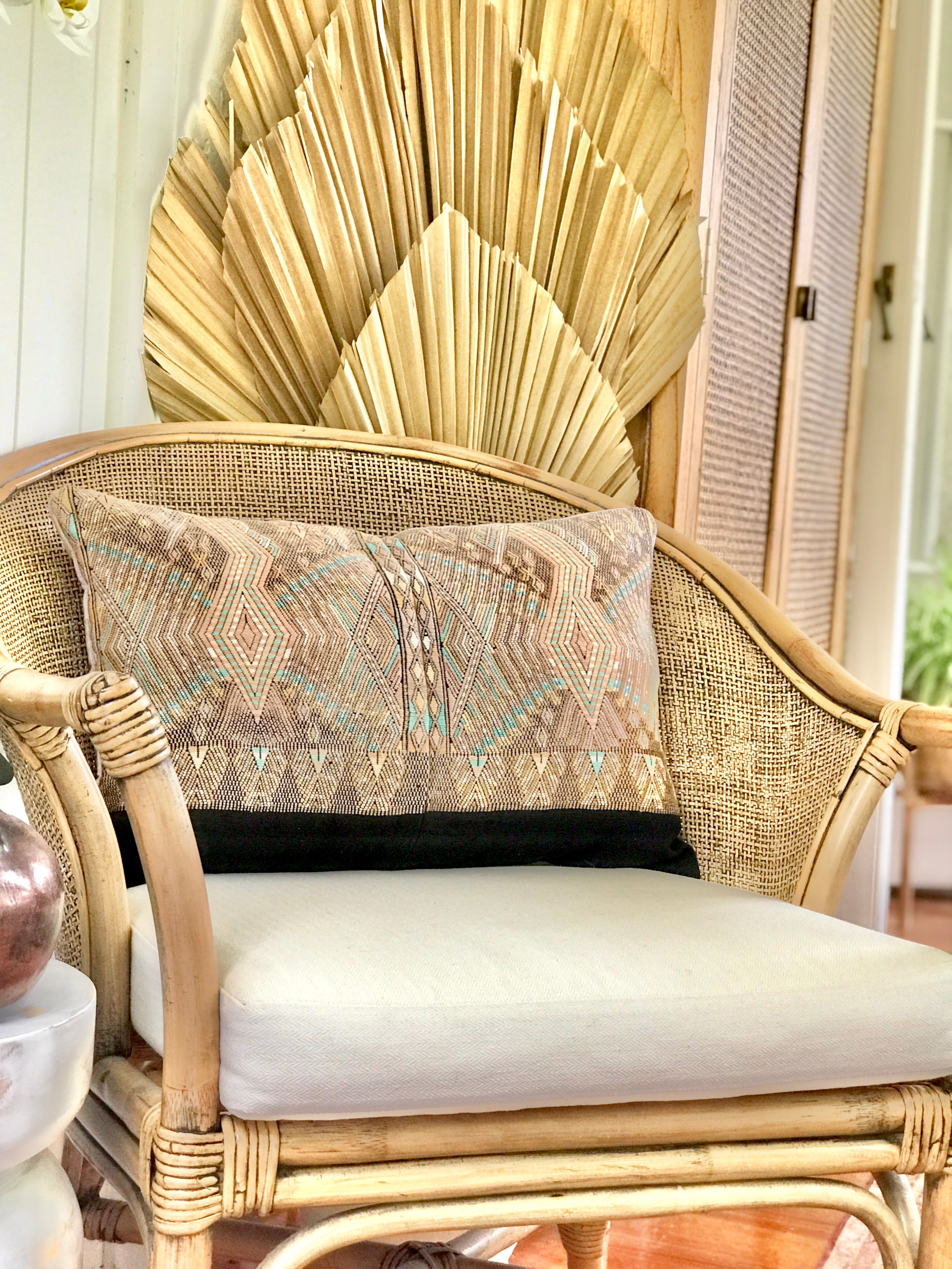 Vintage textile cushions made from a Guatemalan huipil and corte.