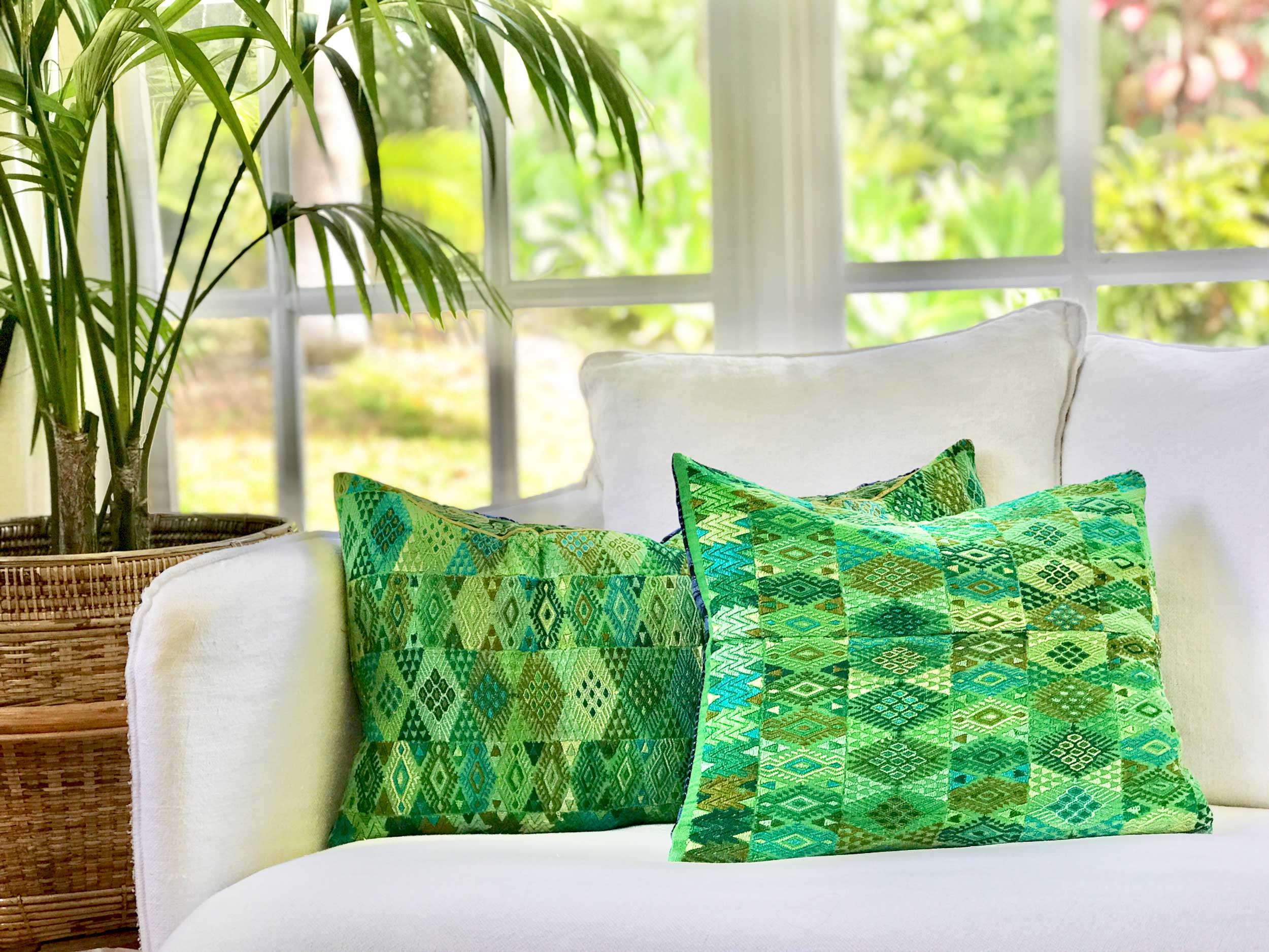 Vintage textile pillows made from a Guatemalan huipil and corte