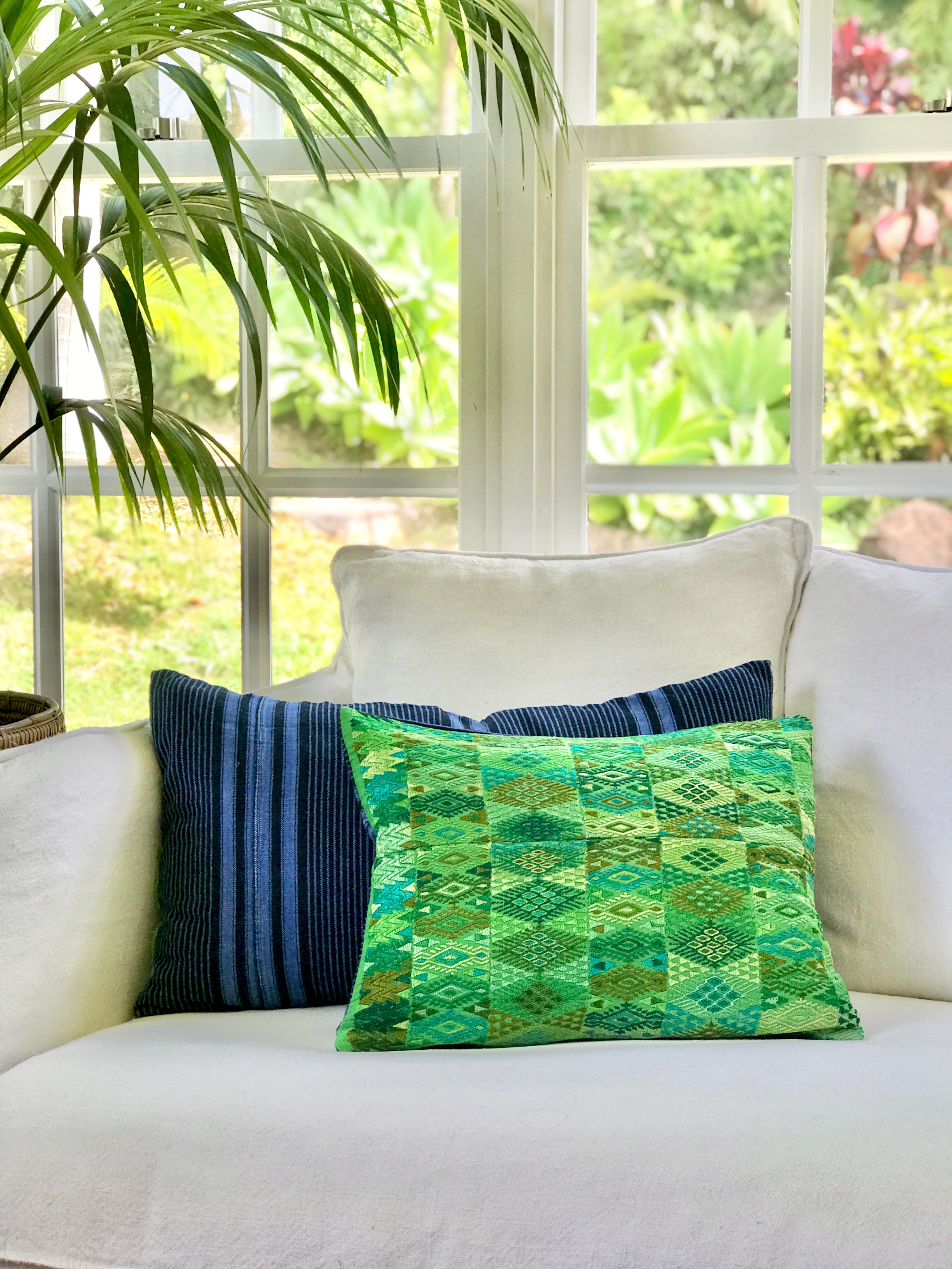 Vintage textile pillows made from a Guatemalan huipil and corte