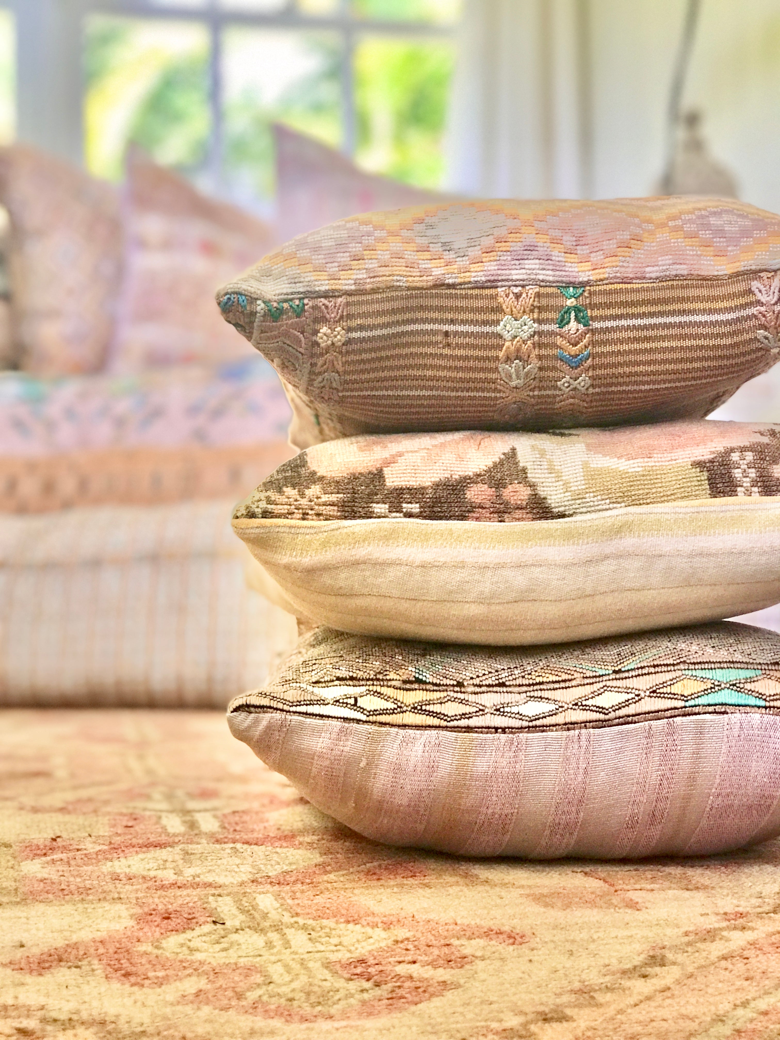 Embroidered Guatemalan huipil textile repurposed into a pillow