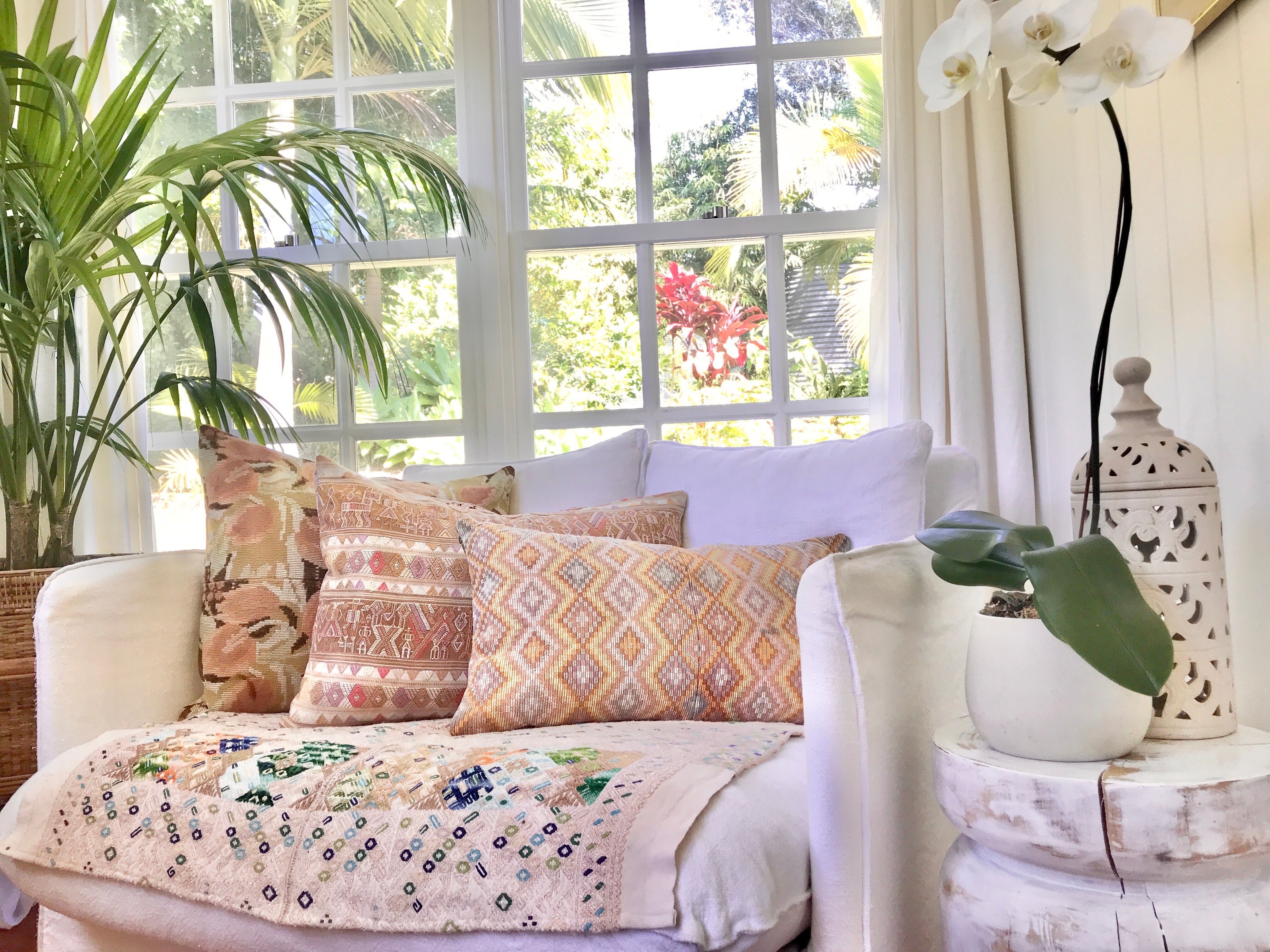 Vintage textile pillows made from a Guatemalan huipil and corte