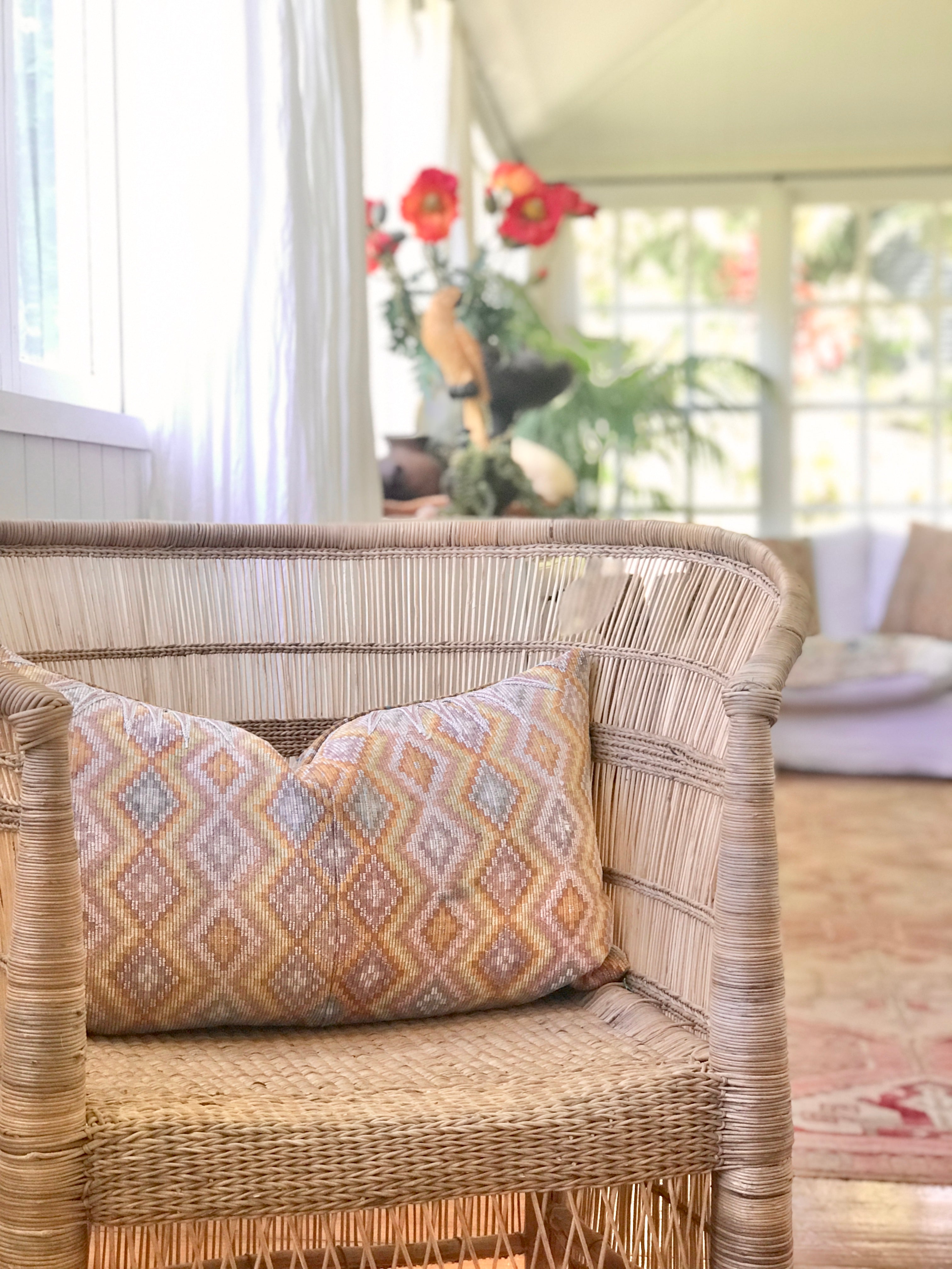 Vintage textile pillows made from a Guatemalan huipil and corte