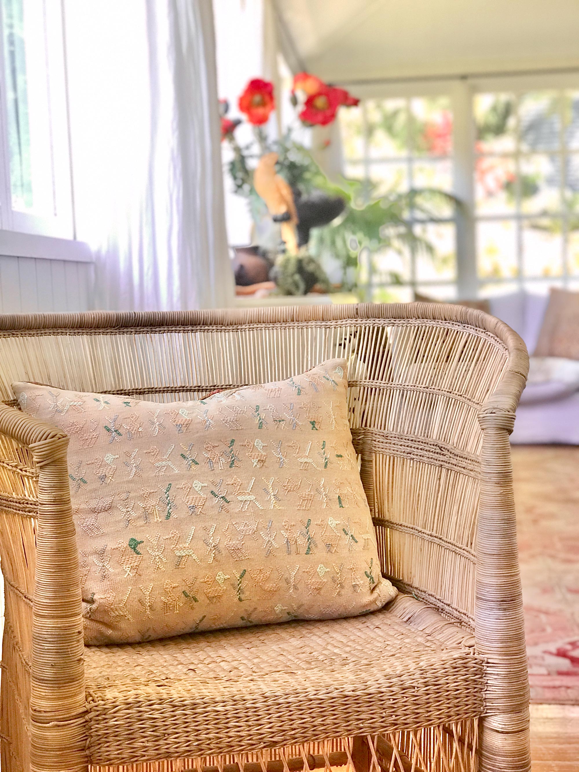 Vintage textile cushions made from a Guatemalan huipil and corte.