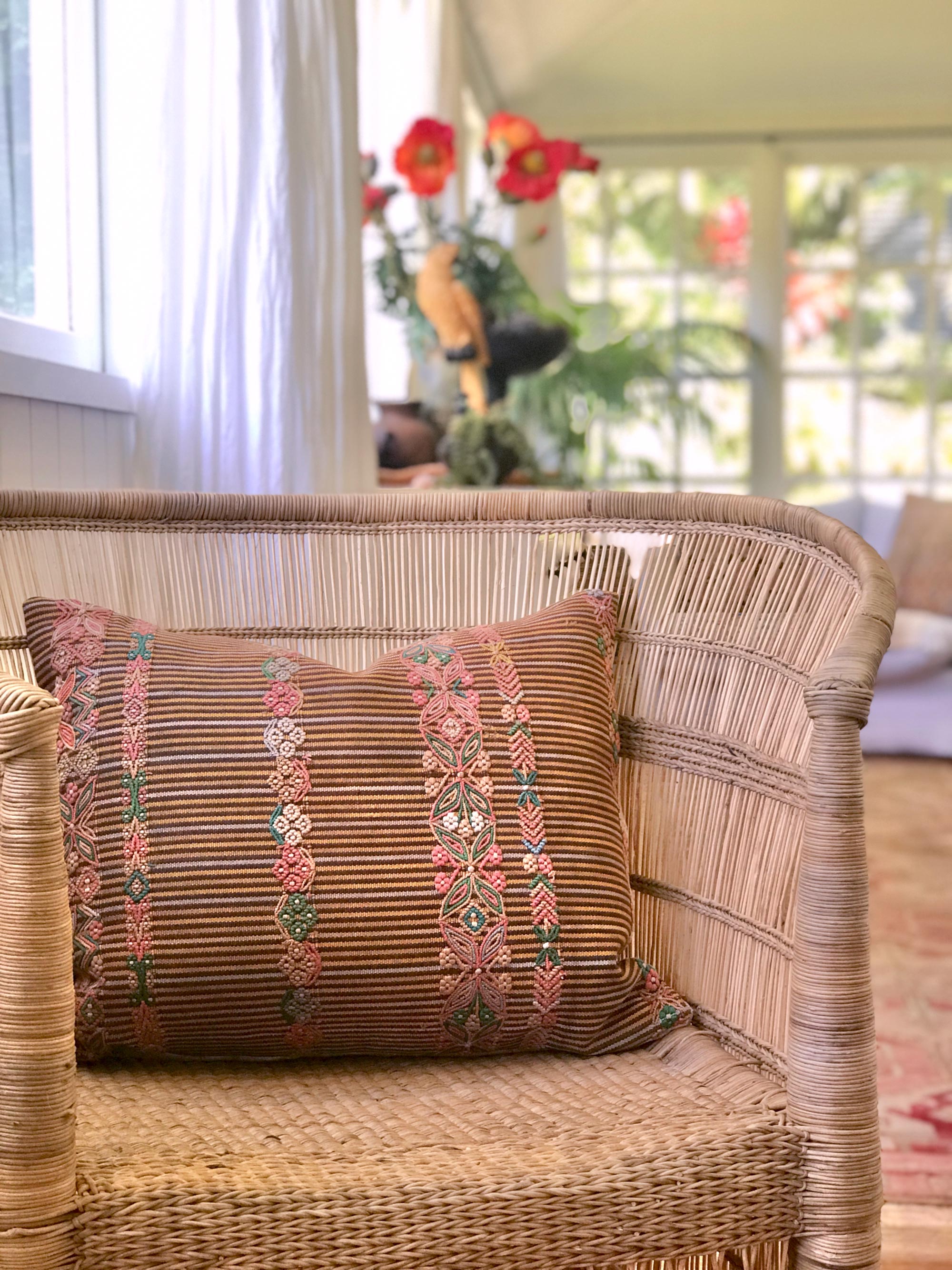 Vintage textile cushions made from a Guatemalan huipil and corte.