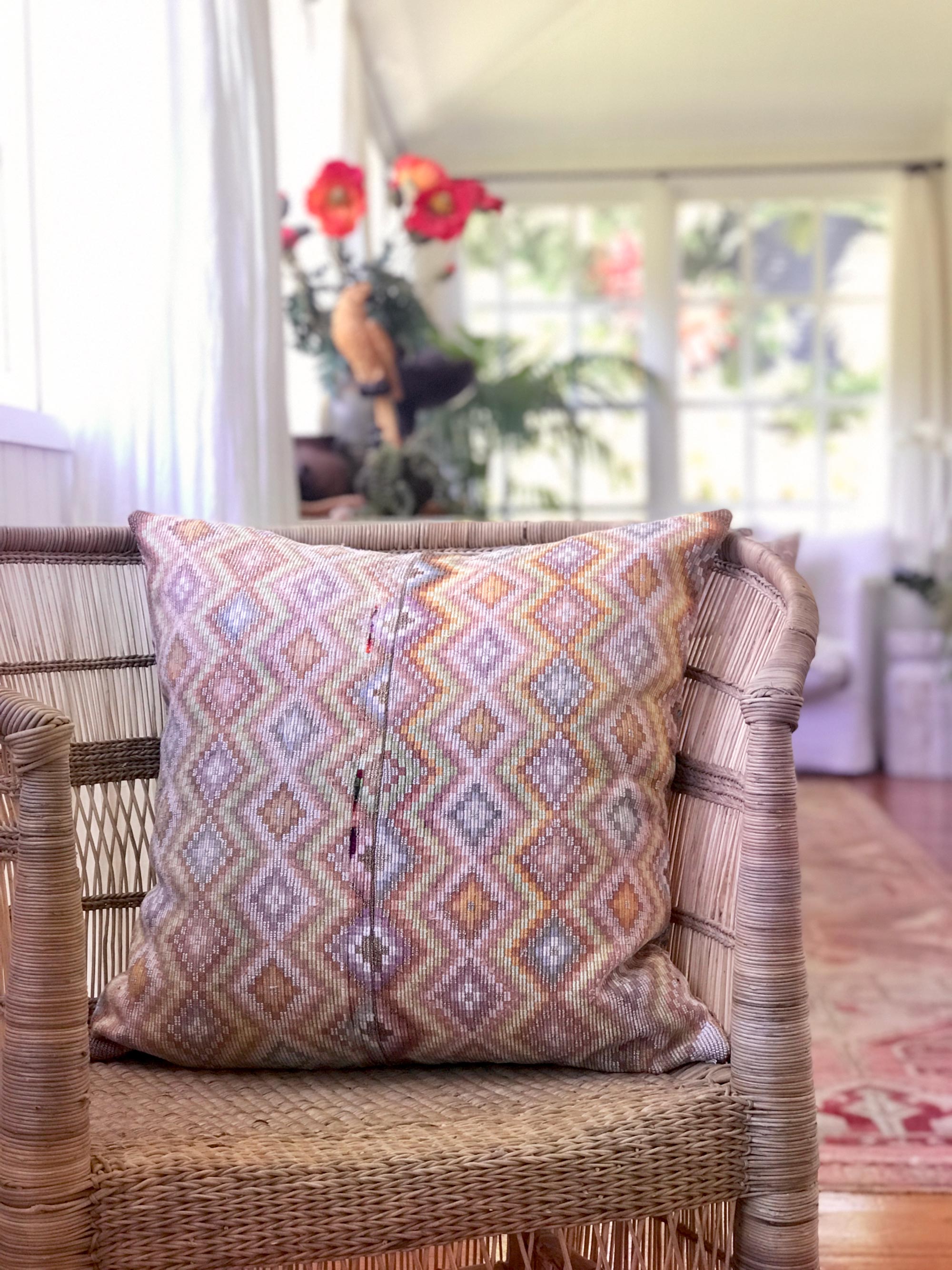 Vintage textile pillows made from a Guatemalan huipil and corte