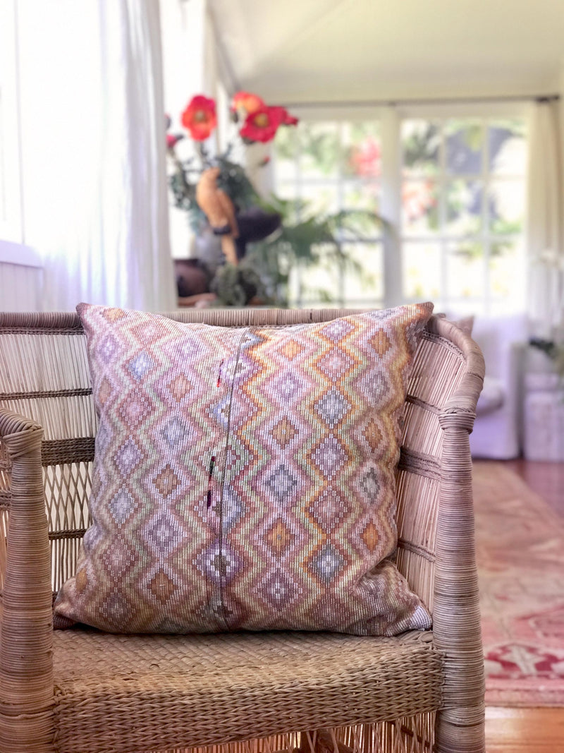 Vintage textile pillows made from a Guatemalan huipil and corte