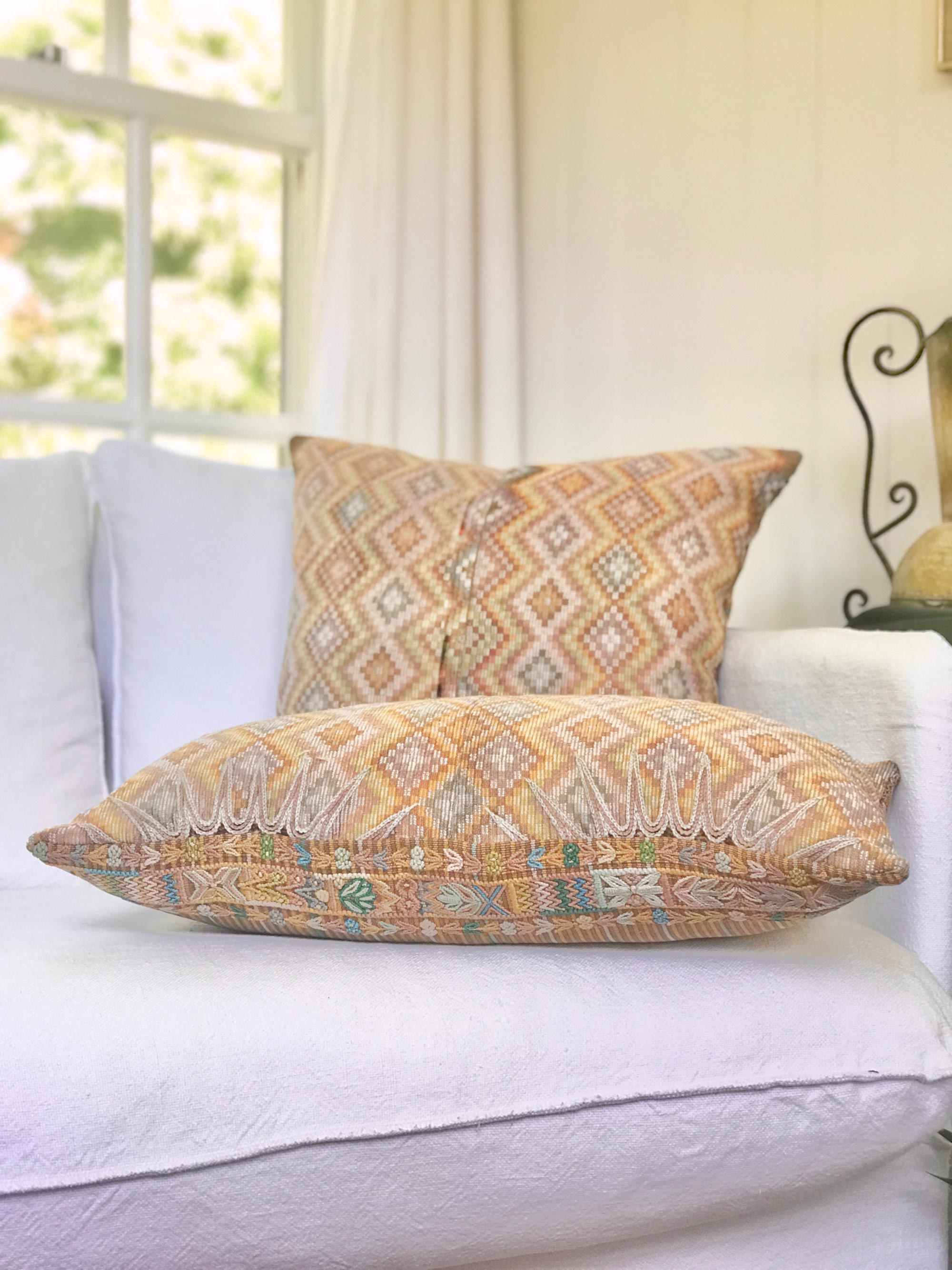 Vintage textile pillows made from a Guatemalan huipil and corte