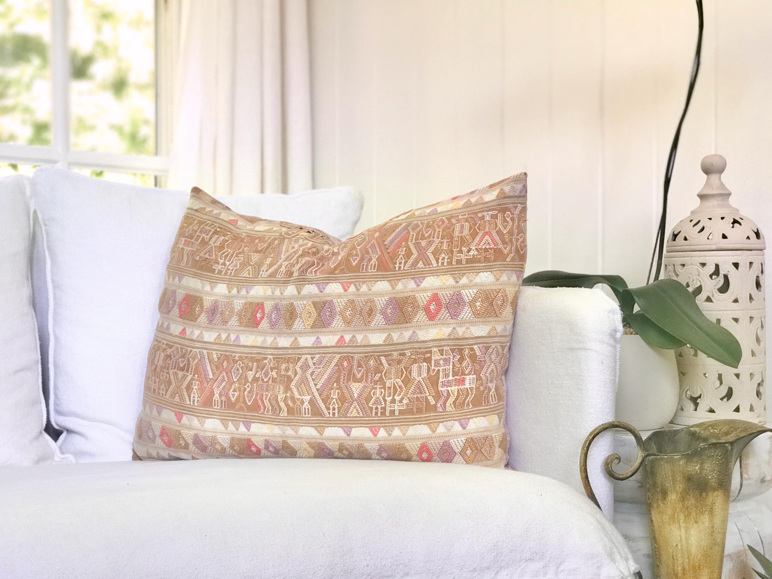 Vintage textile pillows made from a Guatemalan huipil and corte