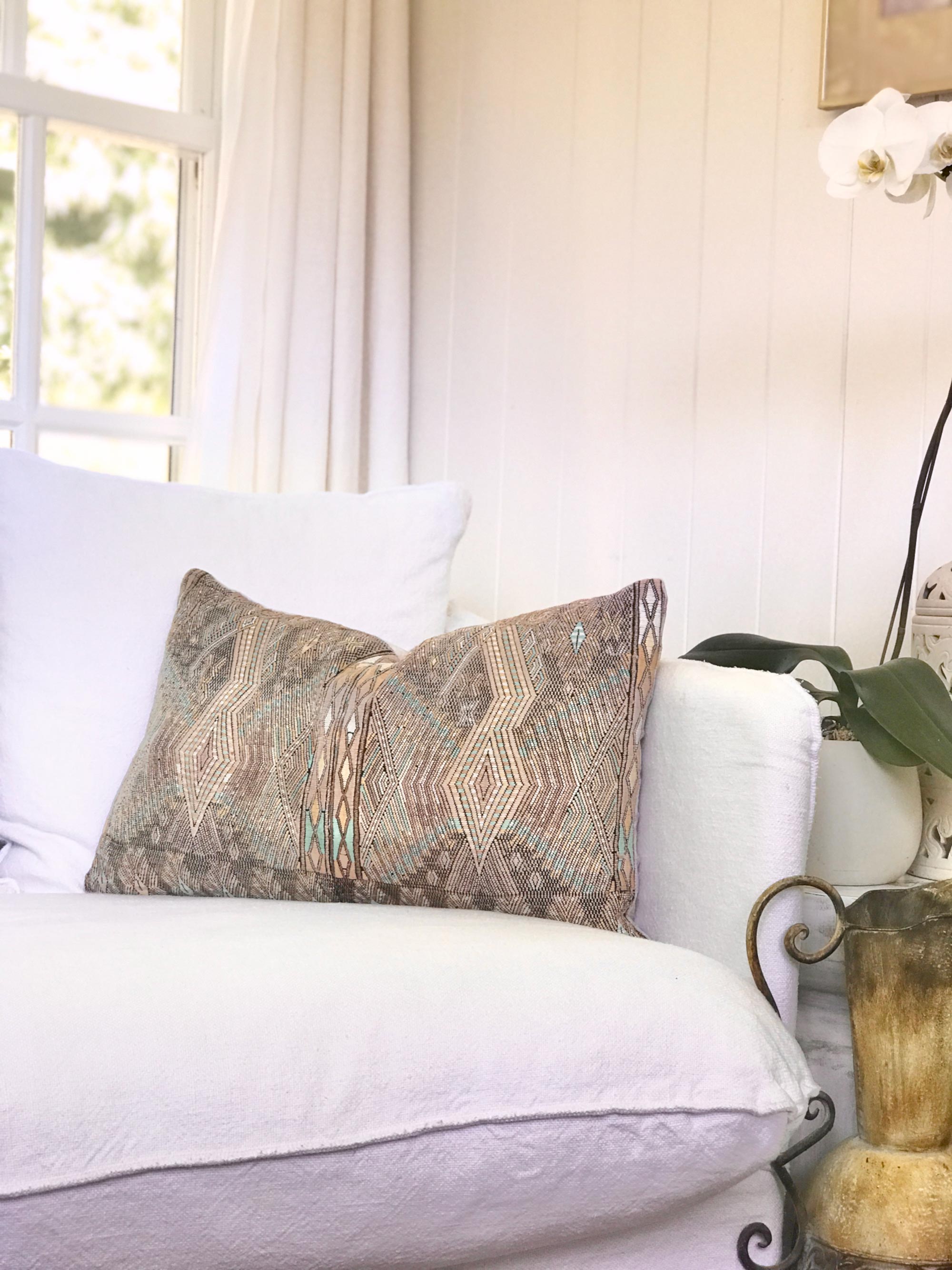 Vintage textile pillows made from a Guatemalan huipil and corte