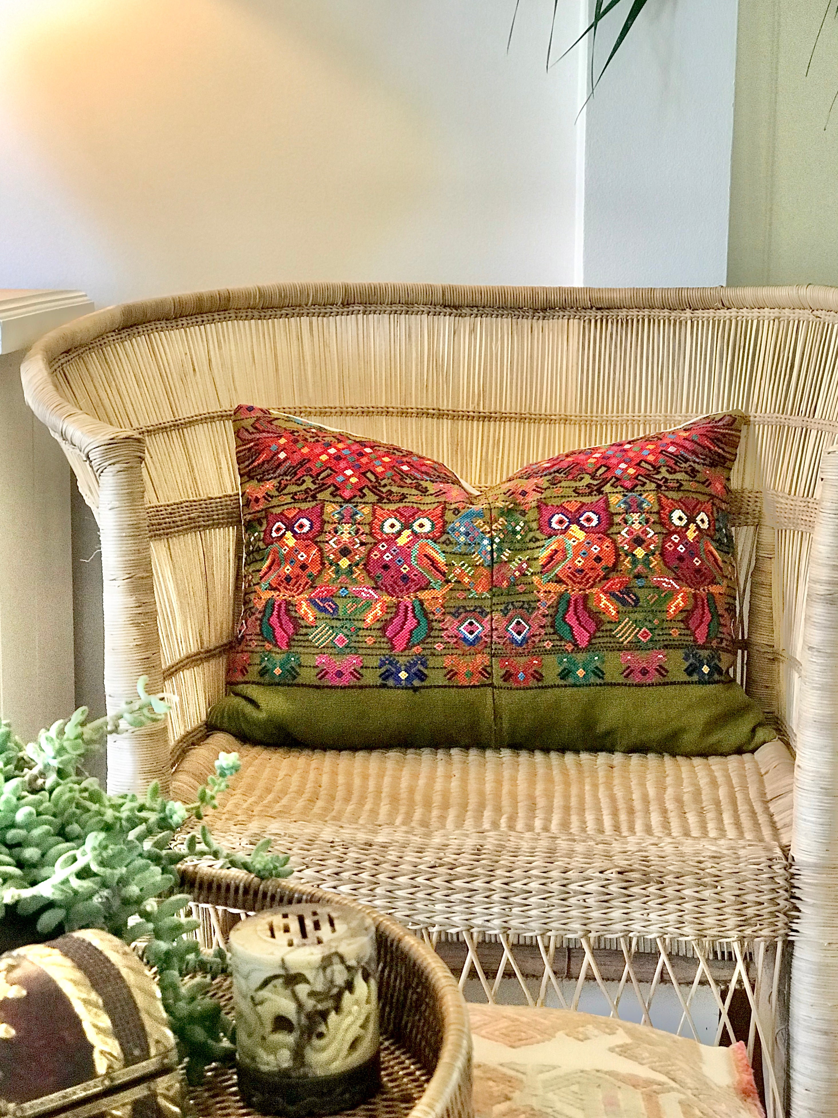 Guatemalan embroidered huipil pillow. Startled owls in a whimsical setting on avocado green cotton