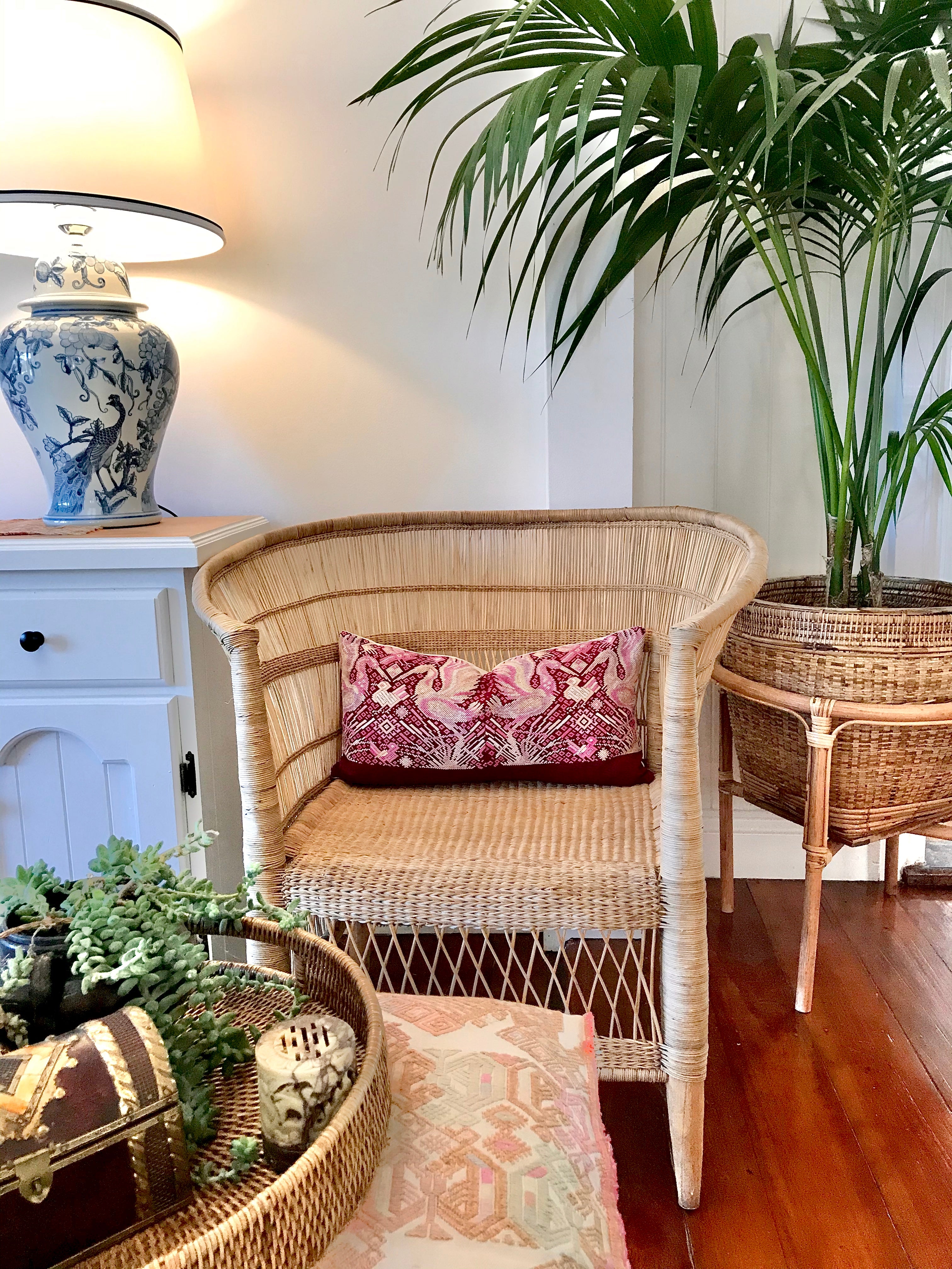 Guatemalan huipil pillow. A fuchsia vintage textile with a chinoiserie style bird design.