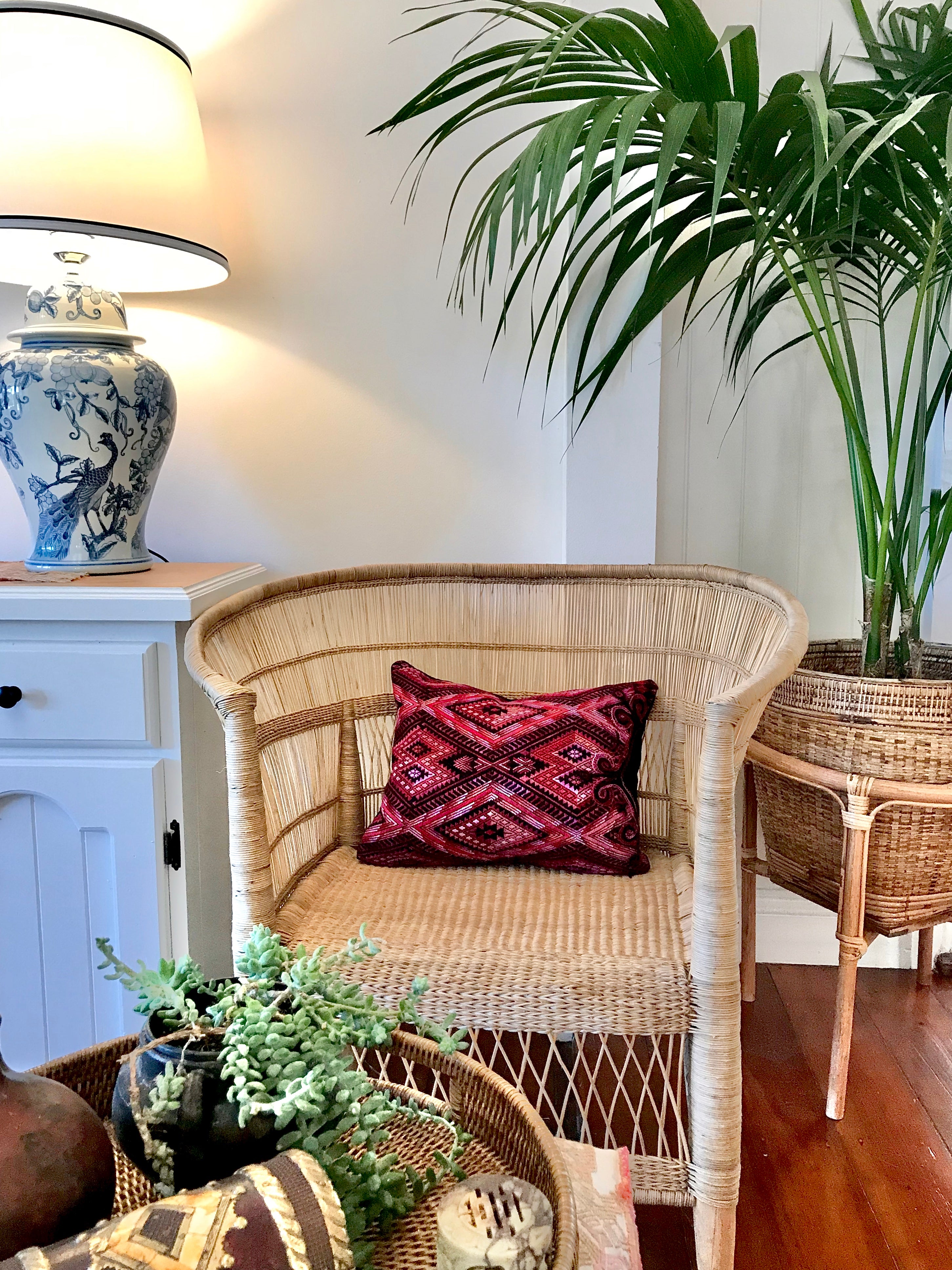 Guatemalan embroidered huipil pillow. Geometric chevron design in bold fuchsia