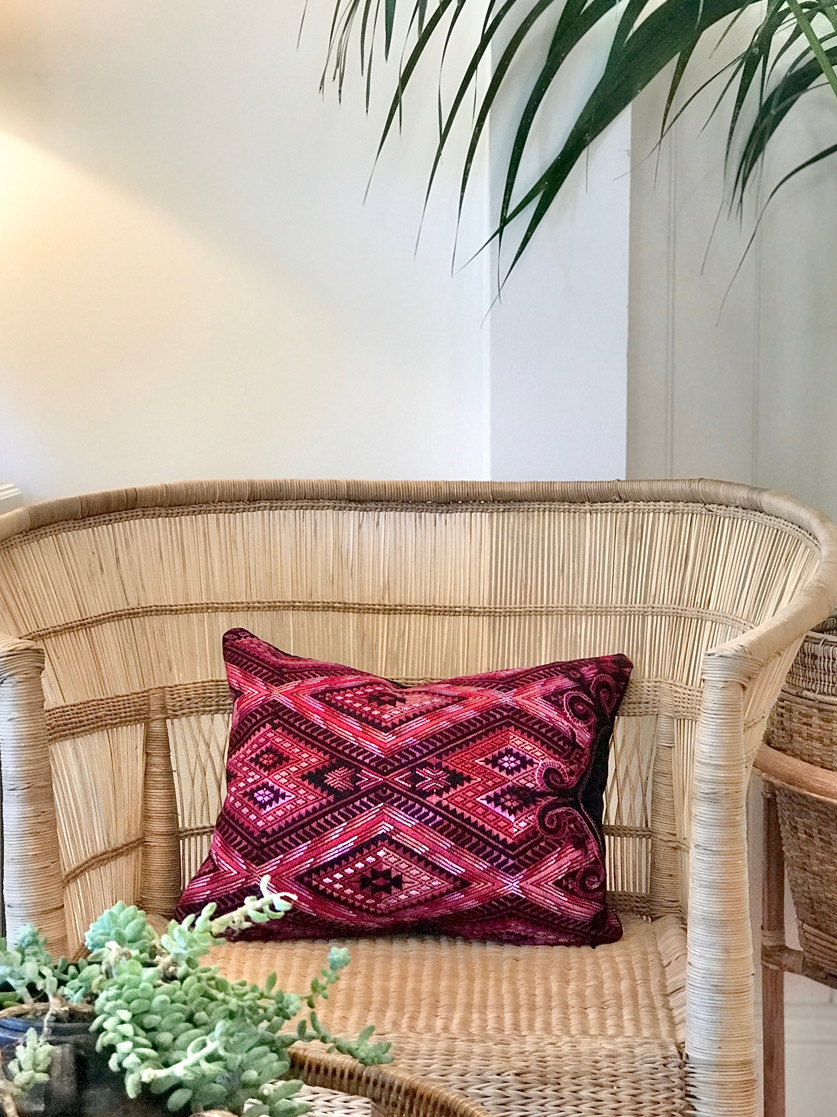 Guatemalan embroidered huipil pillow. Geometric chevron design in bold fuchsia
