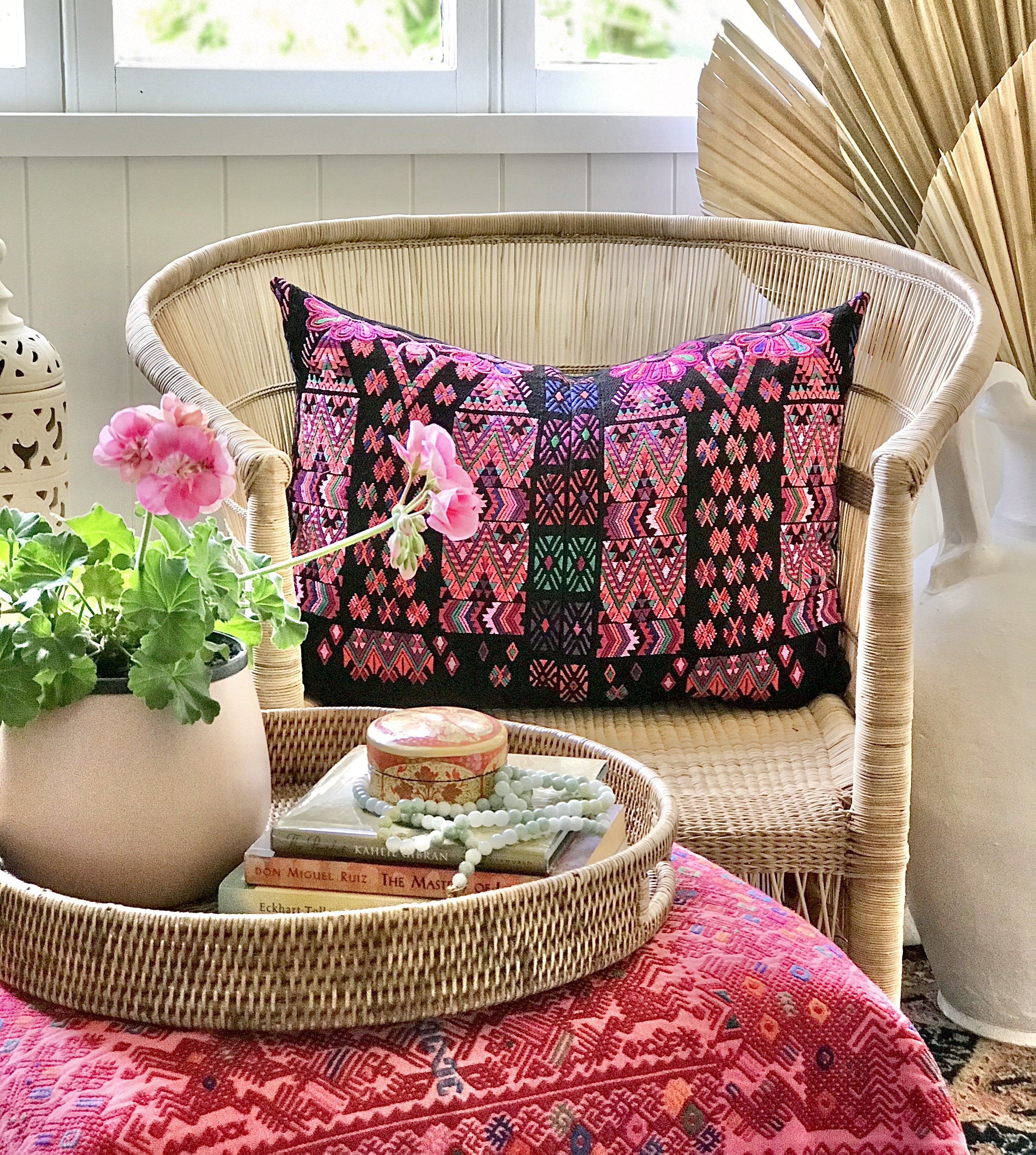 Guatemalan embroidered huipil pillow. Colourful abstract tribal symbols on this vintage textile.