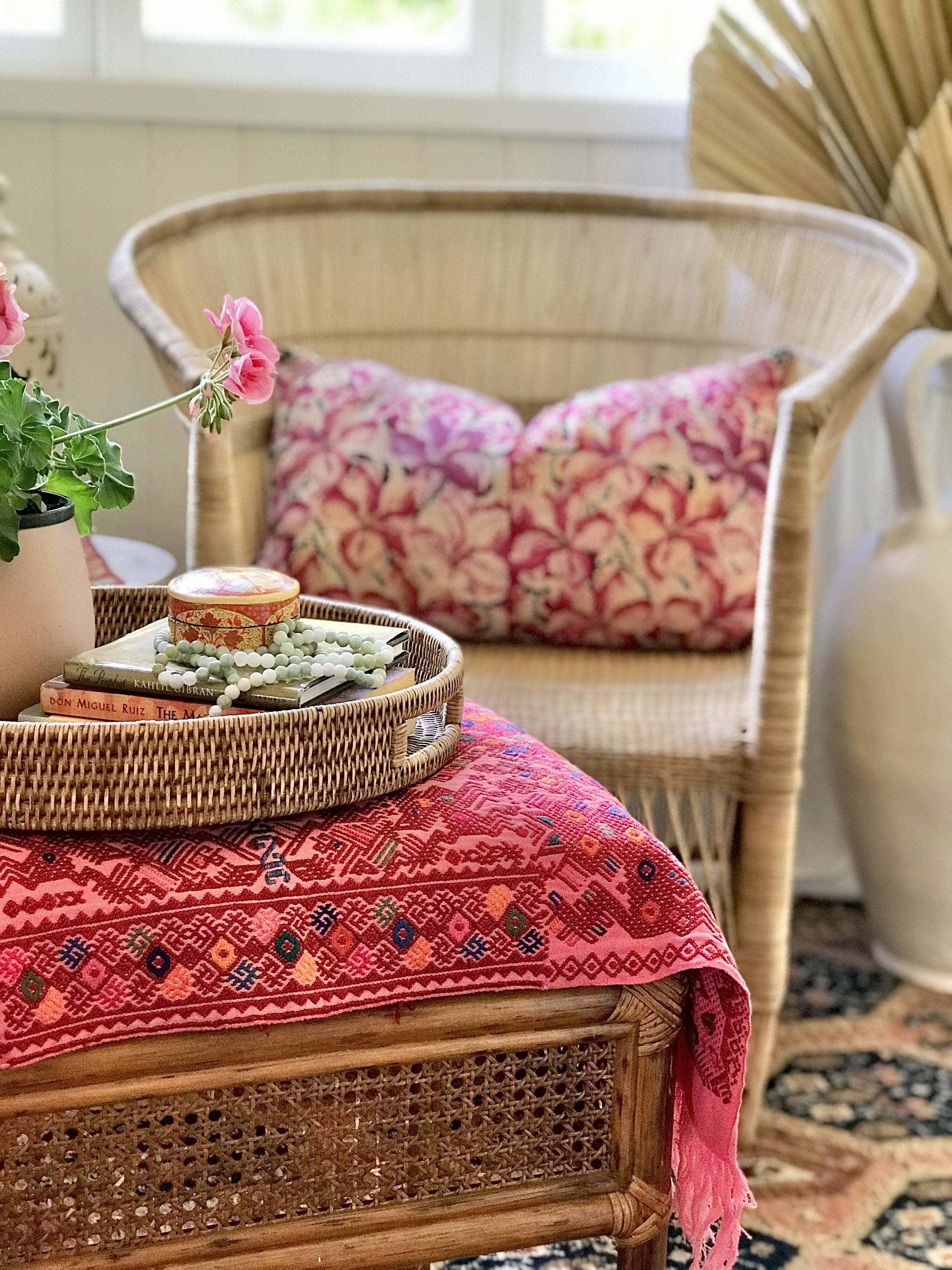 Guatemalan embroidered huipil pillow. A fuchsia vintage textile with an abstract floral design.