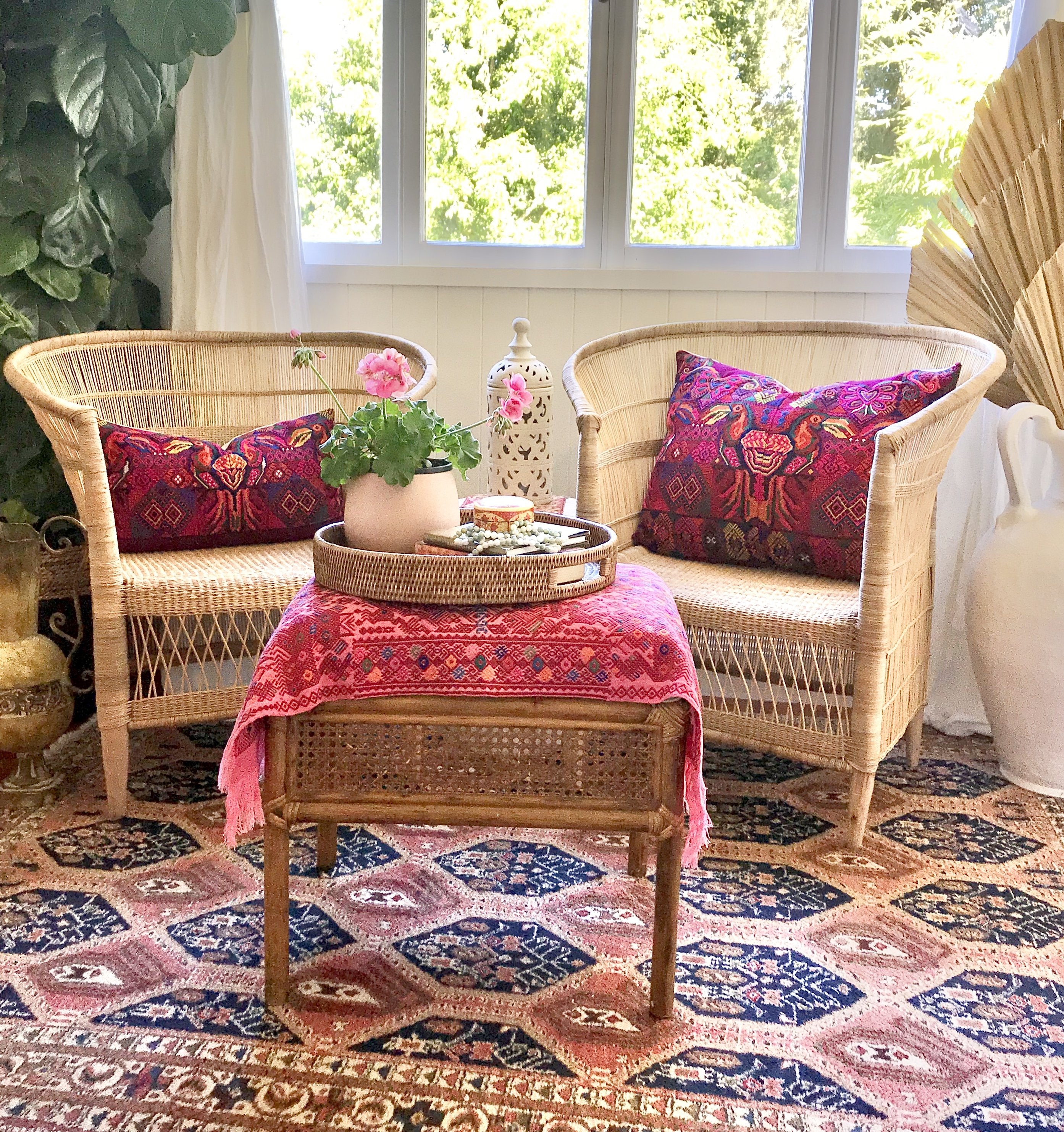 Guatemalan embroidered huipil pillow. A fuchsia vintage textile with colourful kissing Toucans bird design.