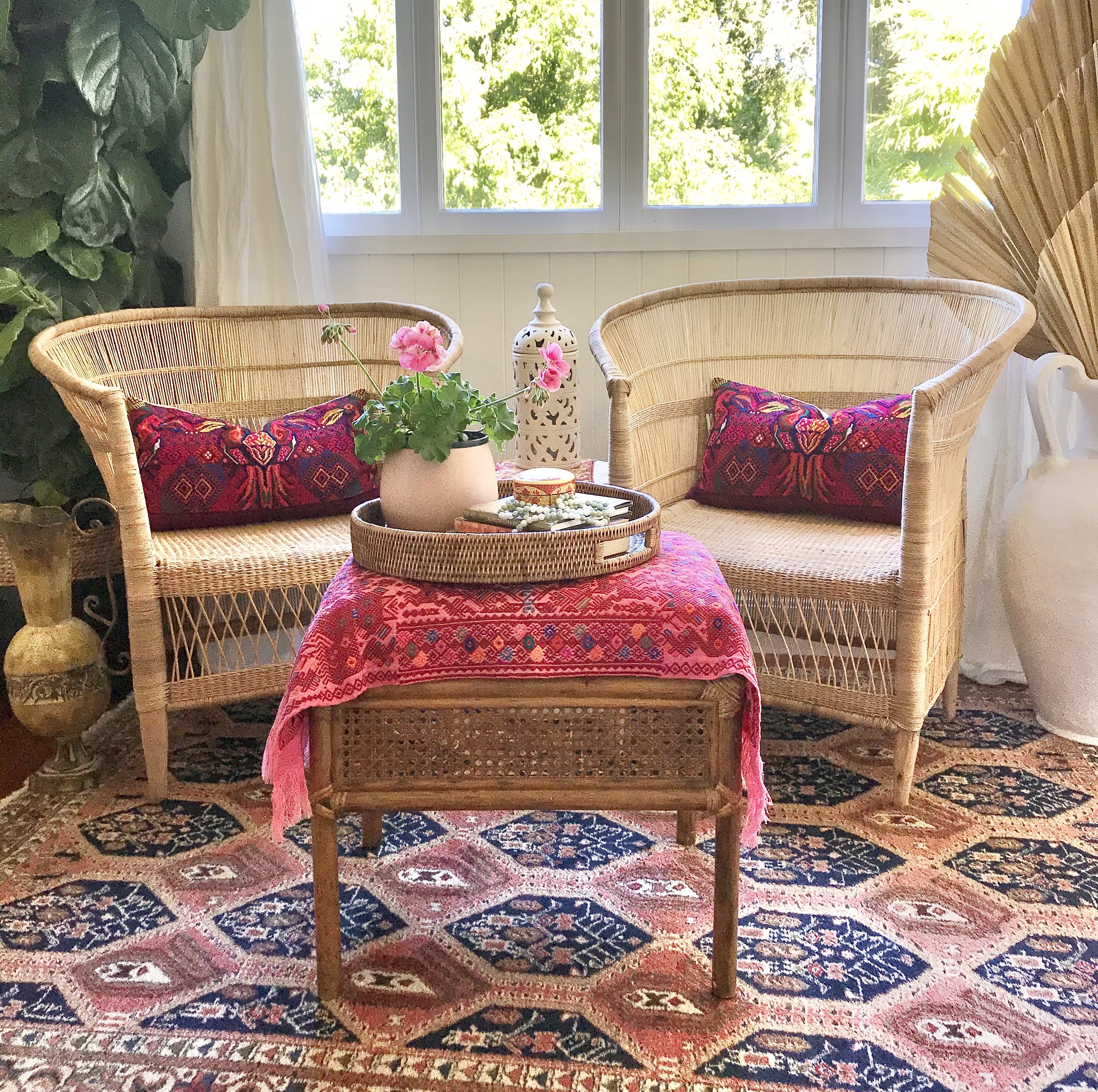 Guatemalan embroidered huipil pillow. A fuchsia vintage textile with colourful kissing Toucans bird design.