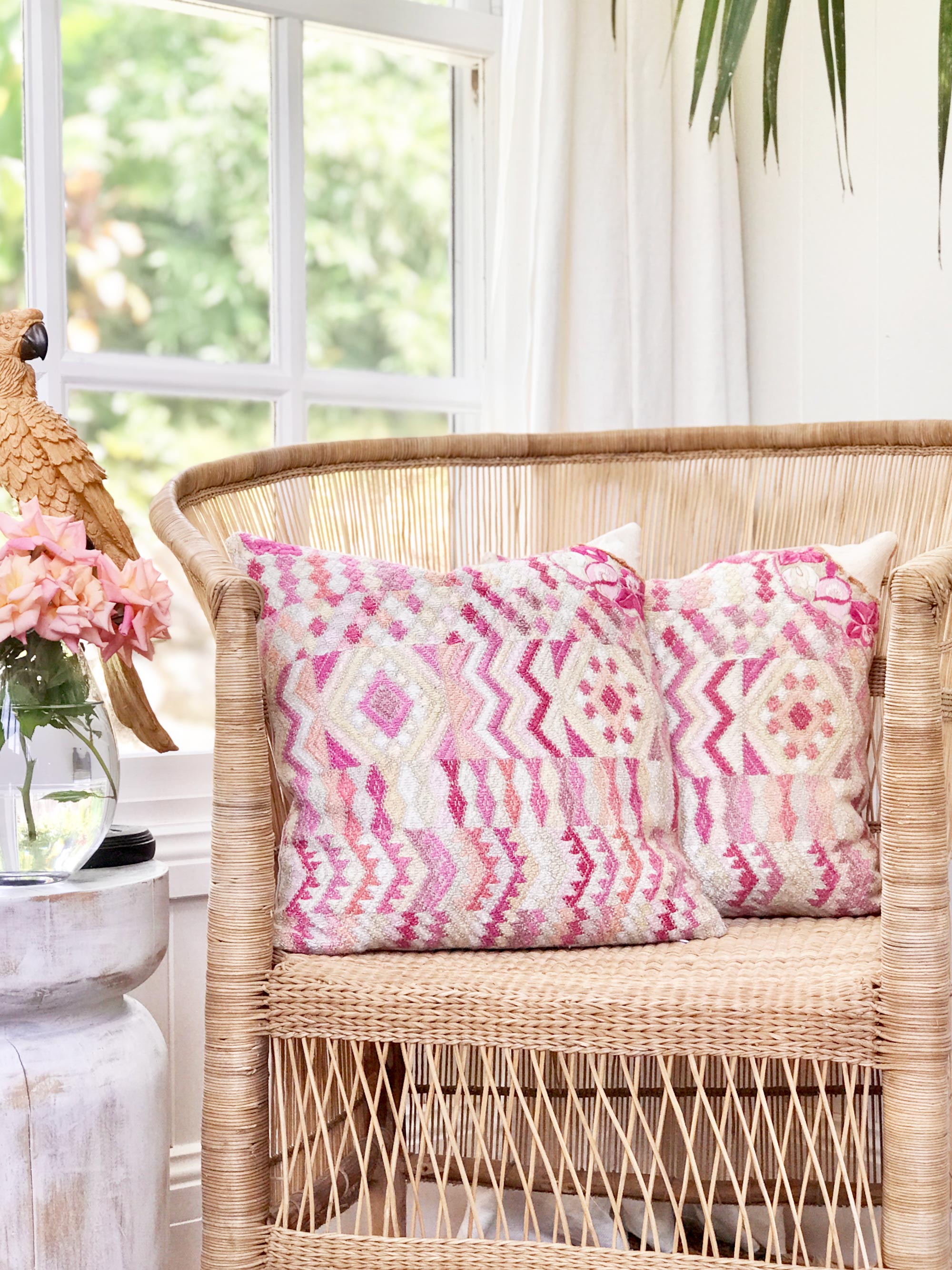 Vintage textile cushion made from a Guatemalan huipil and corte