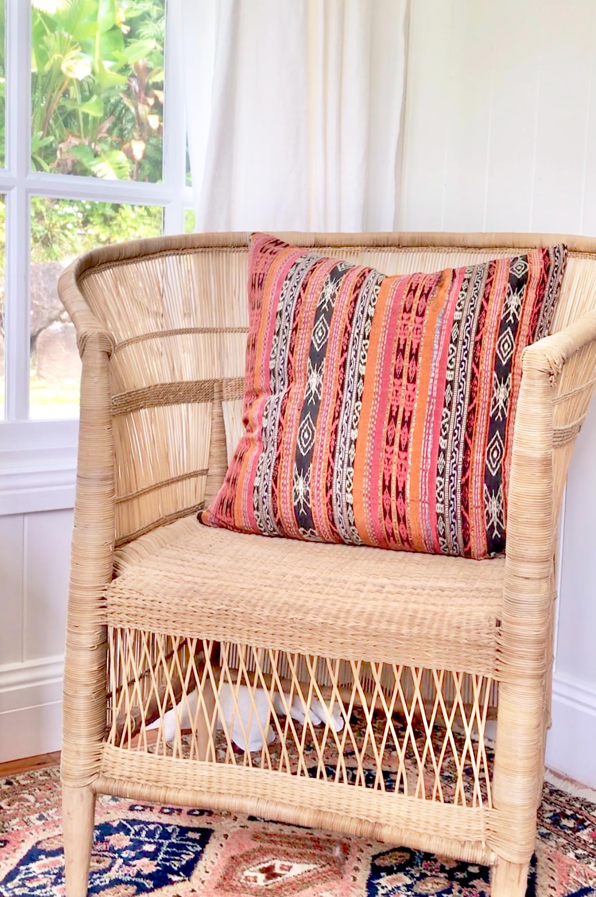 Vintage textile cushion made from a Guatemalan huipil and corte