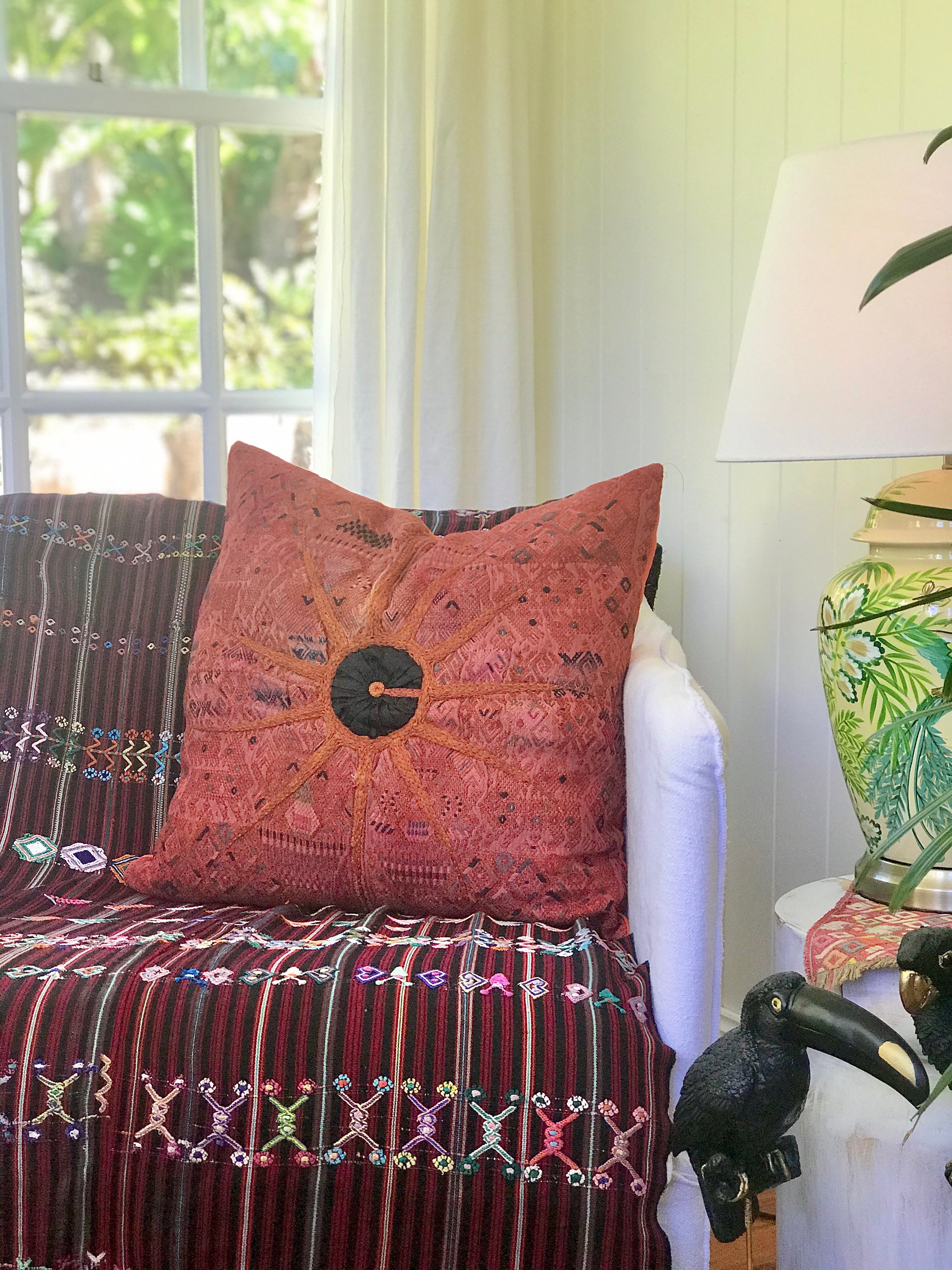 Guatemalan Huipil Textile Pillow, vintage, hand embroidered orange Nahuala huipil with a black sun in the centre