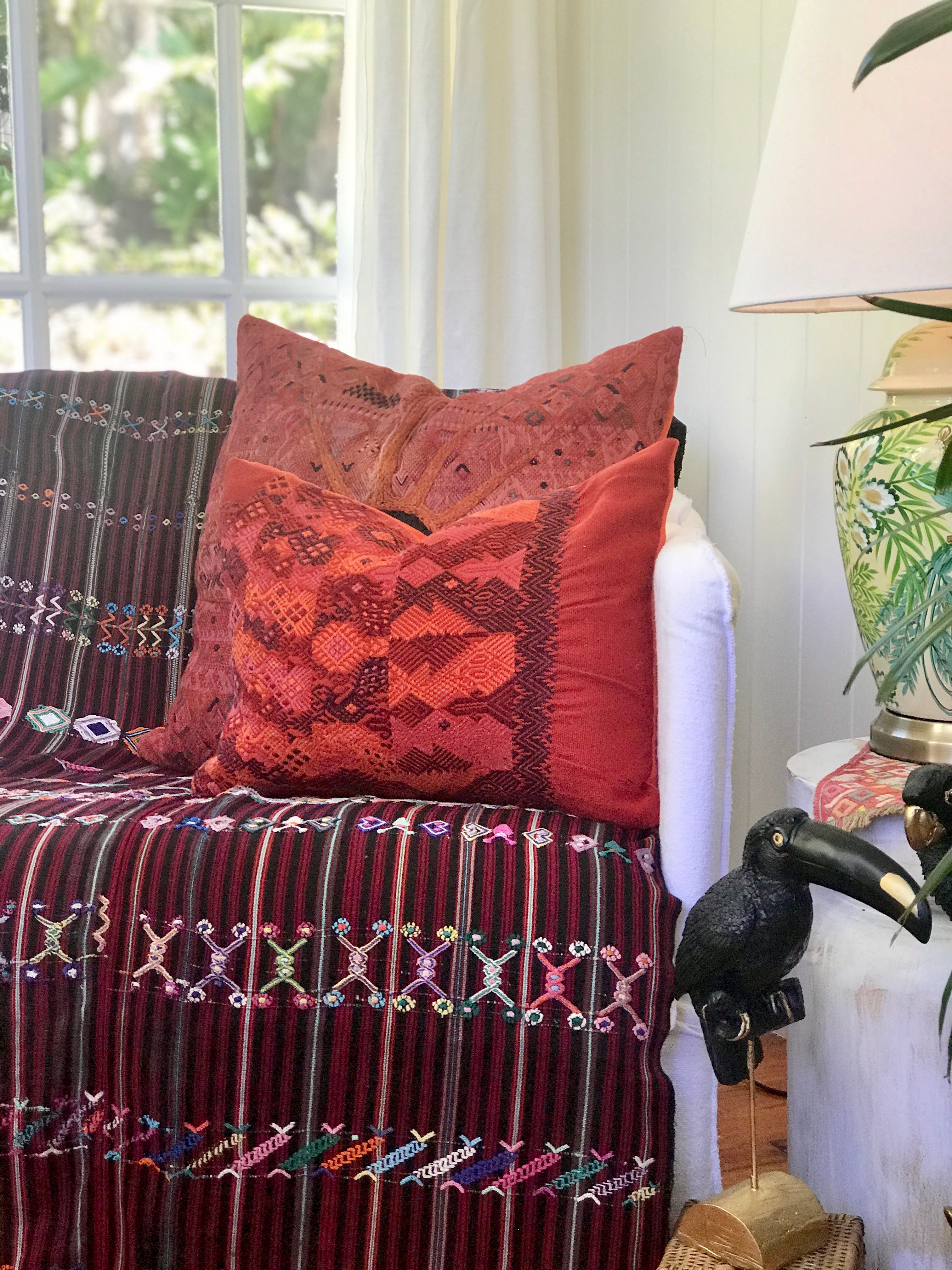 Guatemalan Huipil Textile Pillow, vintage, hand embroidered warm red Coban huipil with stylised peacocks and deer