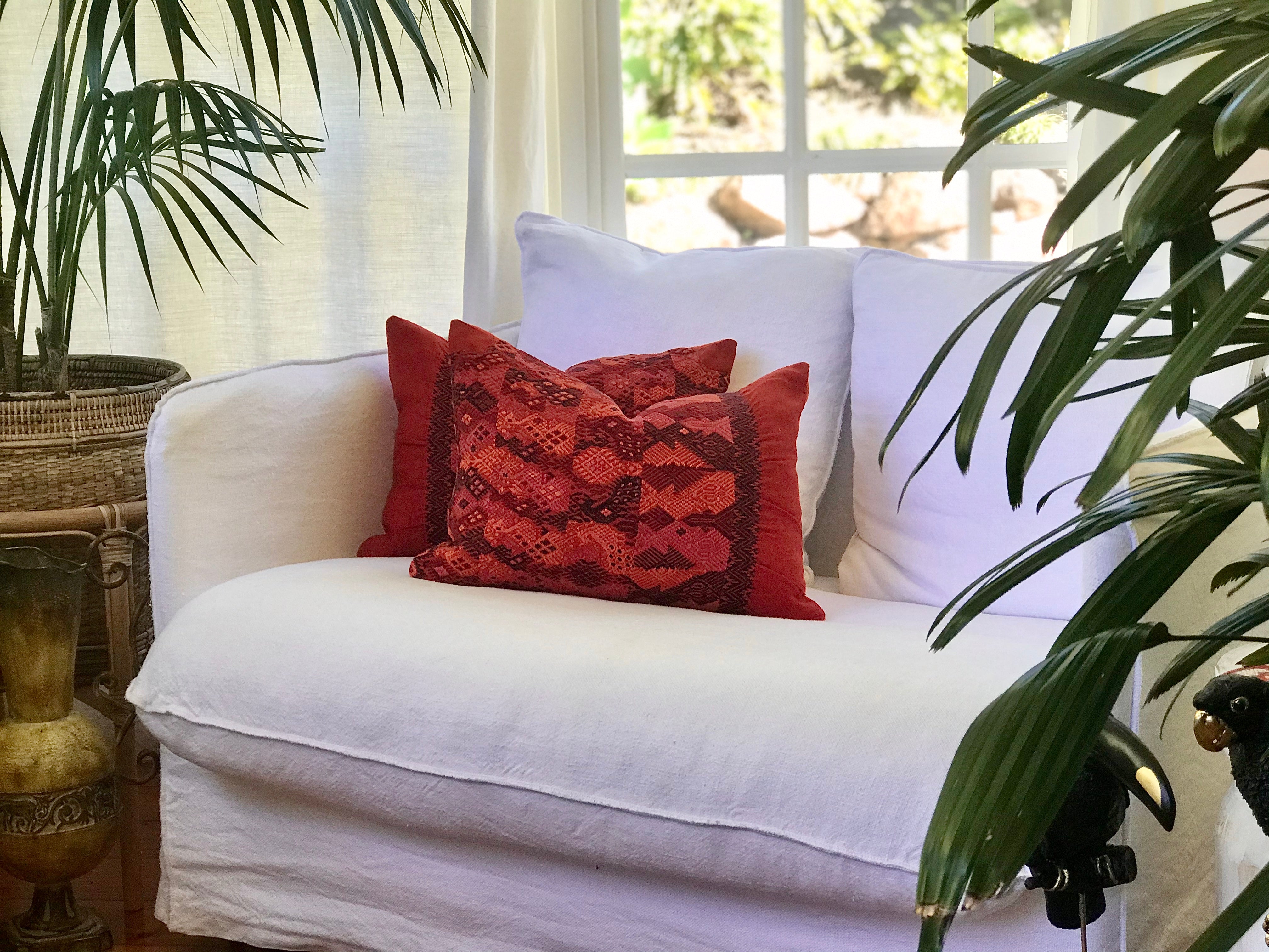 Guatemalan Huipil Textile Pillow, vintage, hand embroidered warm red Coban huipil with stylised peacocks and deer