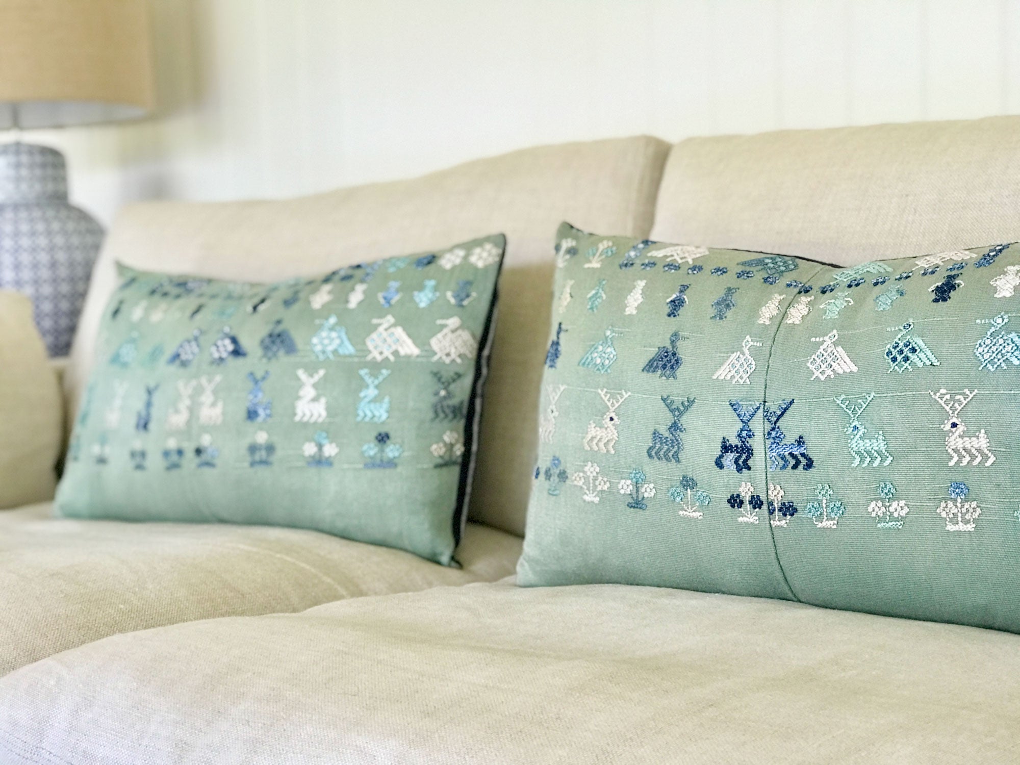 Vintage textile cushion made from a Guatemalan huipil and corte