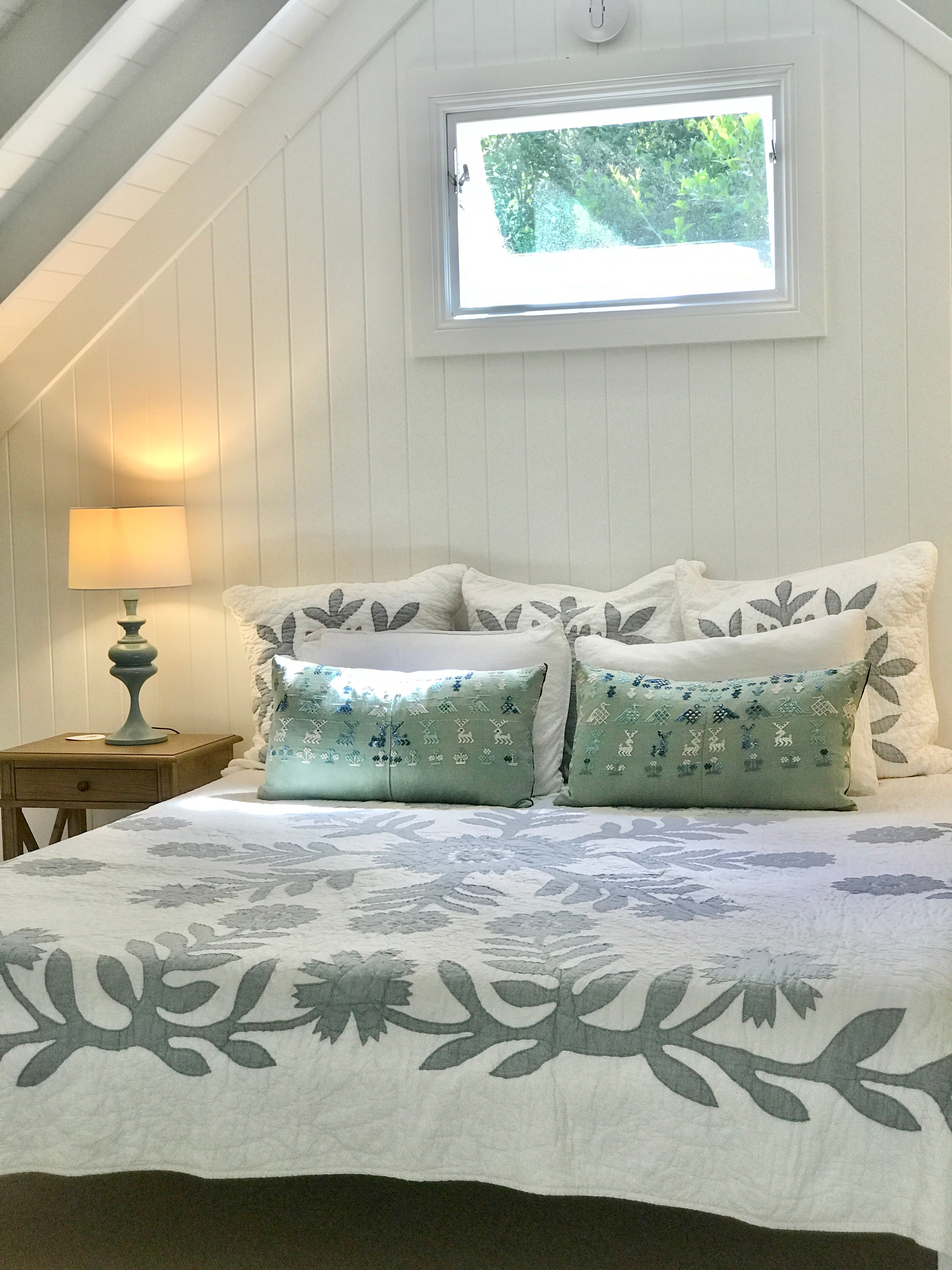 Vintage textile cushion made from a Guatemalan huipil and corte