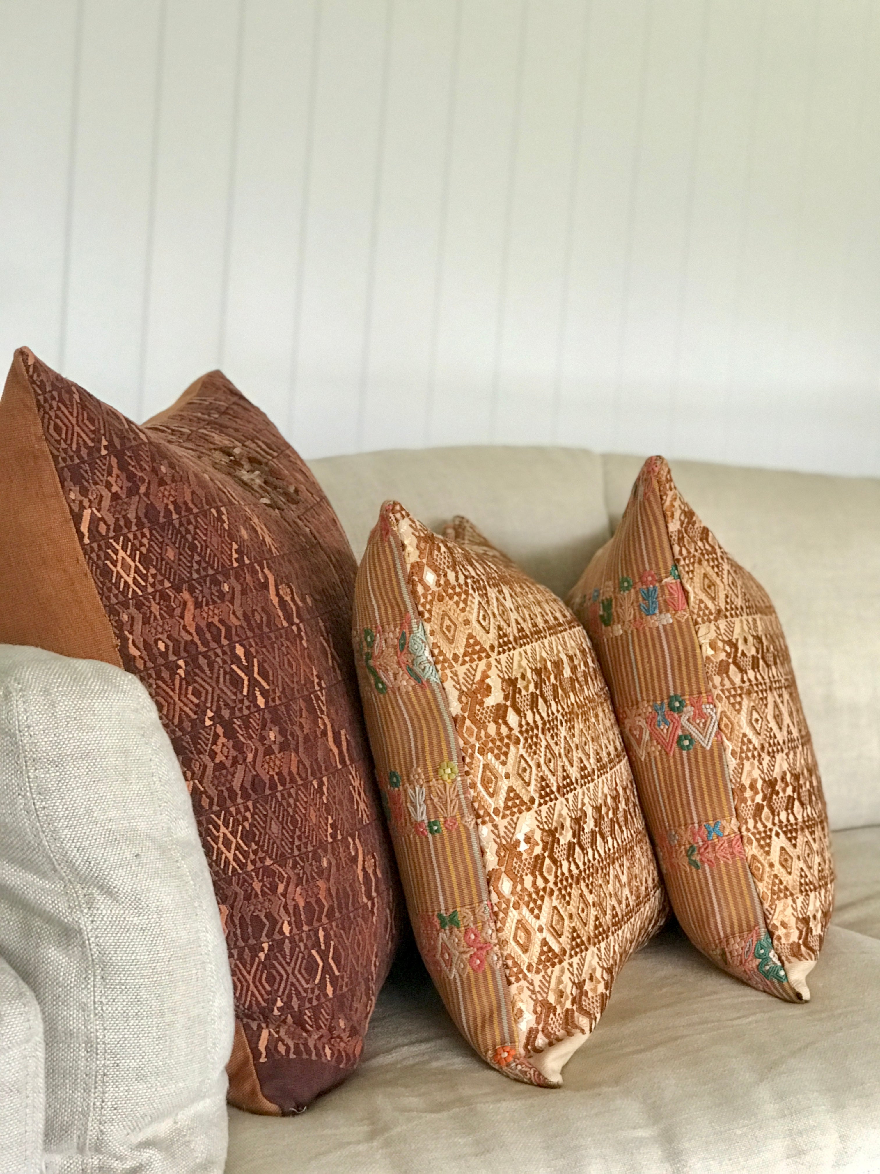Vintage textile cushion made from a Guatemalan huipil and corte