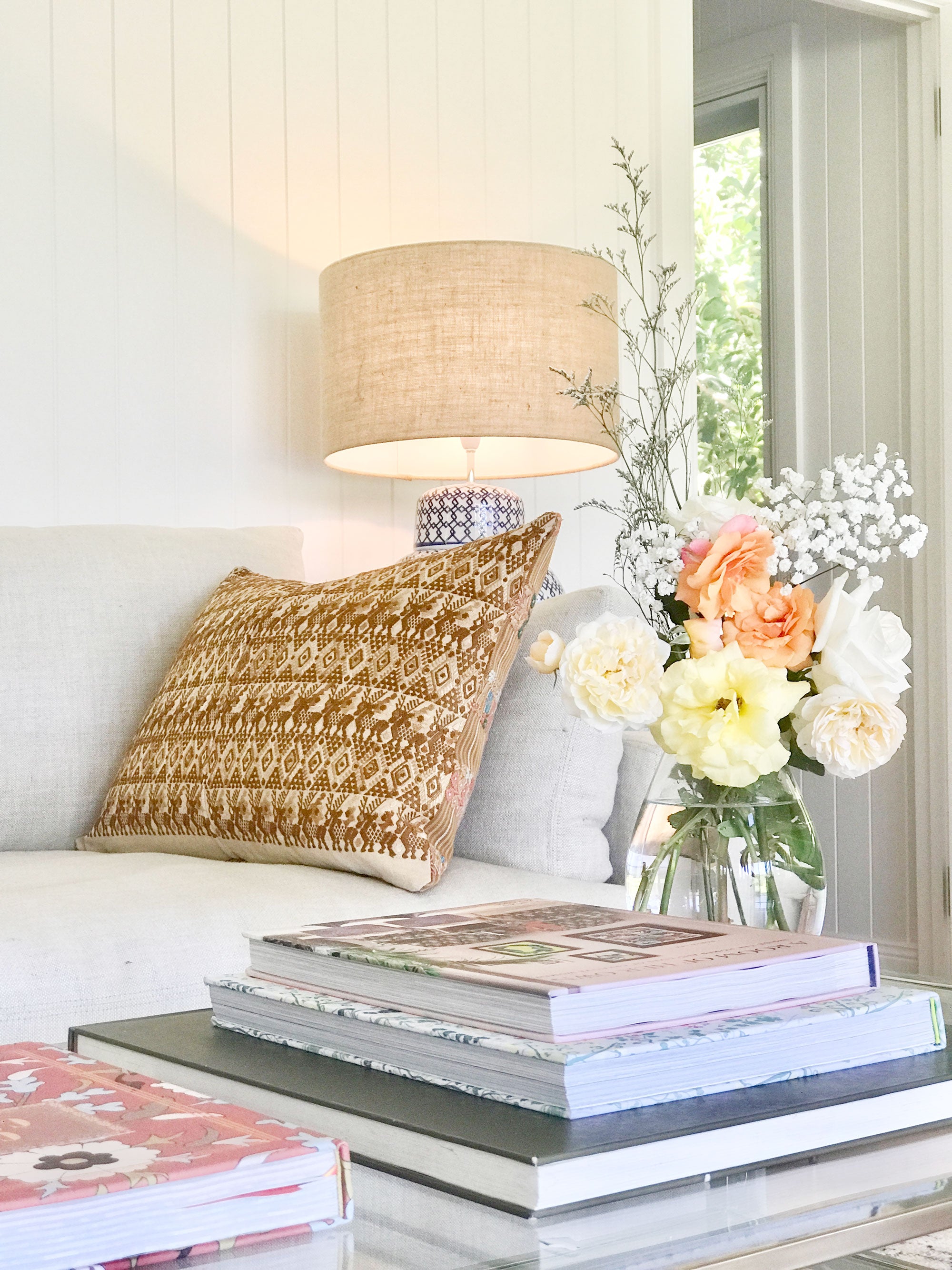 Vintage textile cushion made from a Guatemalan huipil and corte