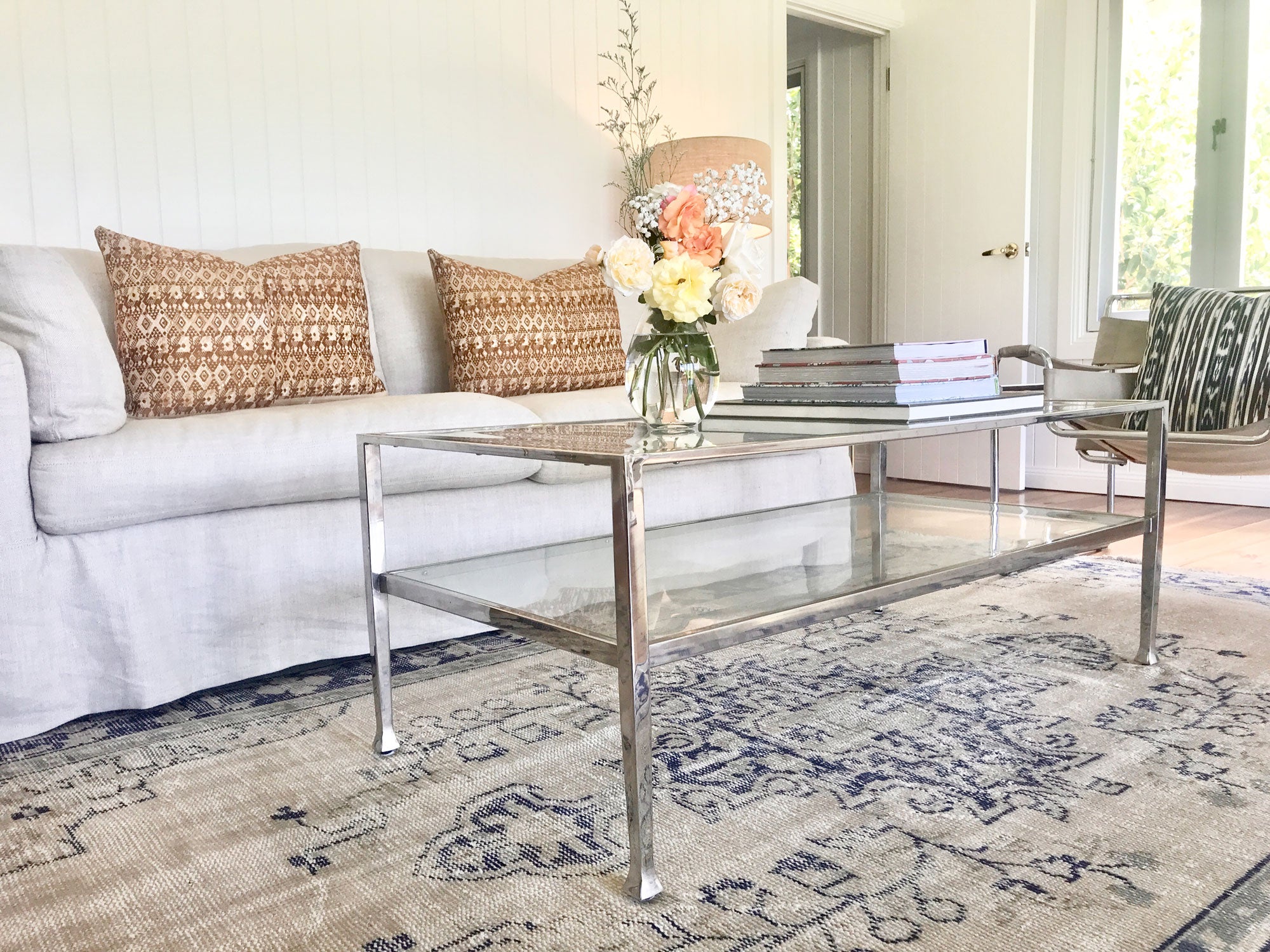 Vintage textile cushion made from a Guatemalan huipil and corte