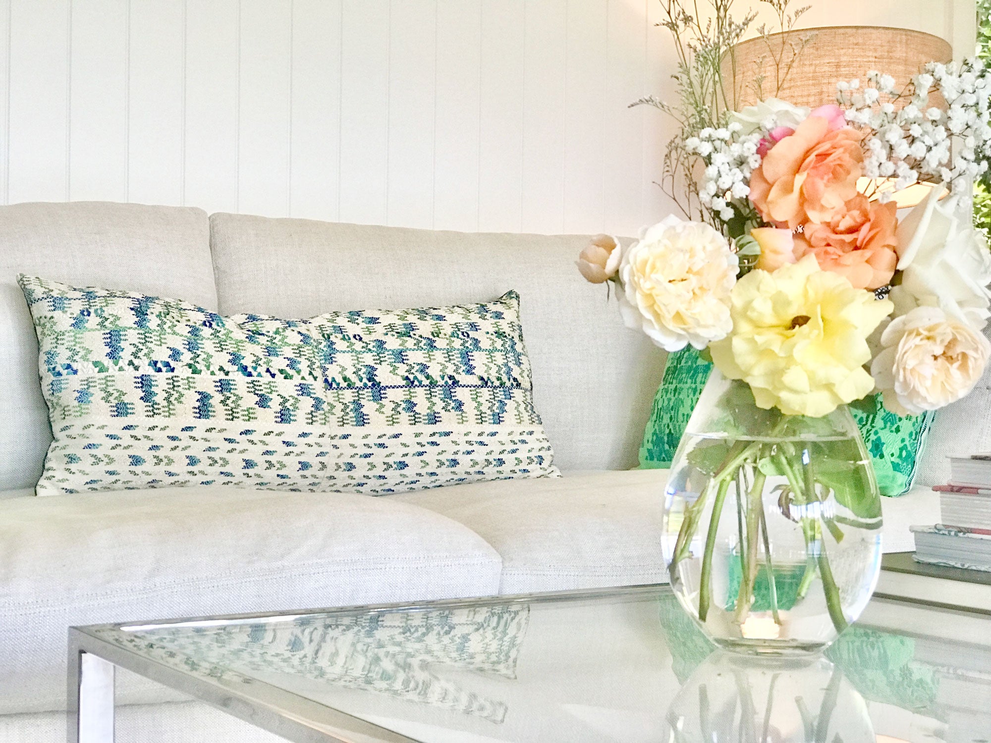 Vintage textile cushion made from a Guatemalan huipil and corte