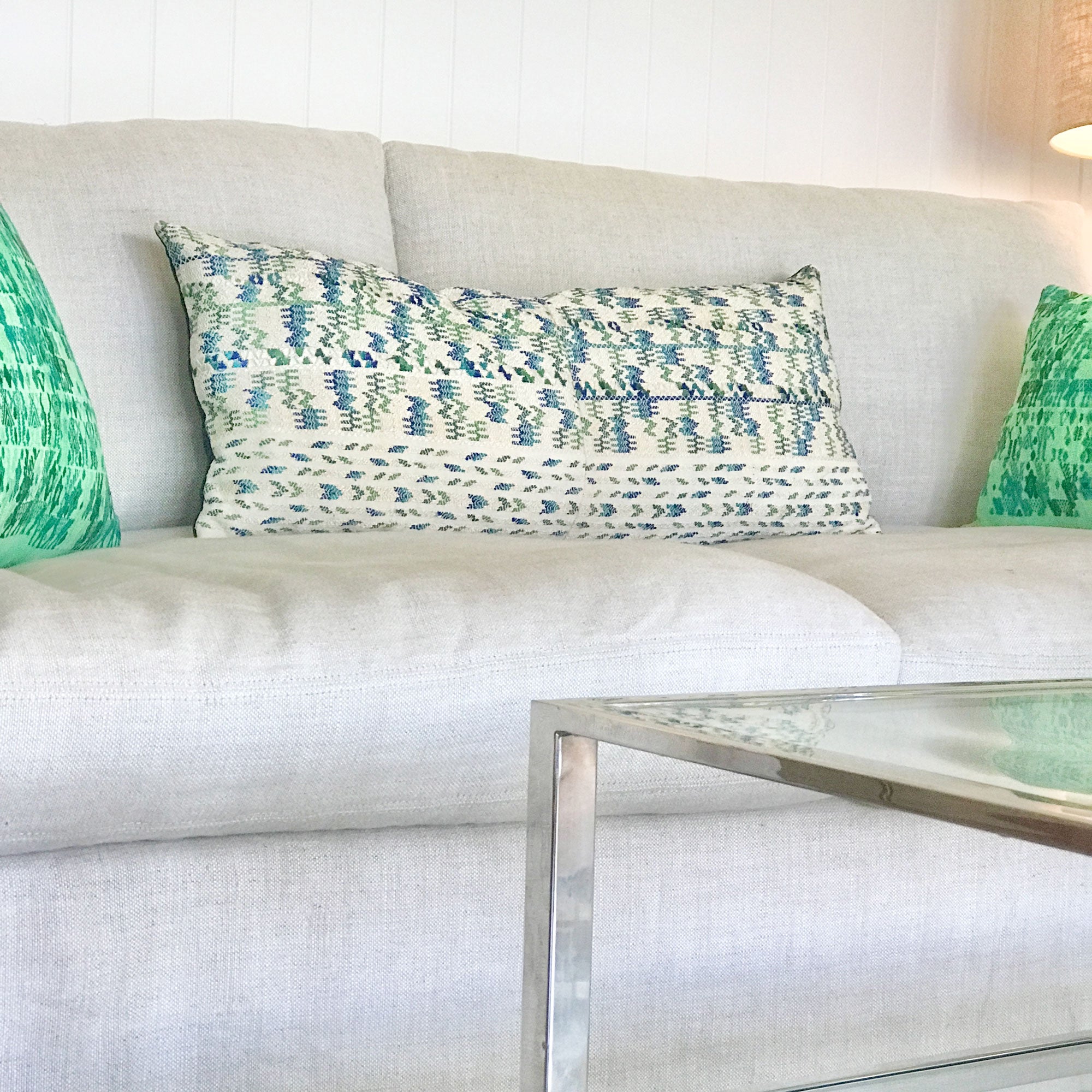 Vintage textile cushion made from a Guatemalan huipil and corte