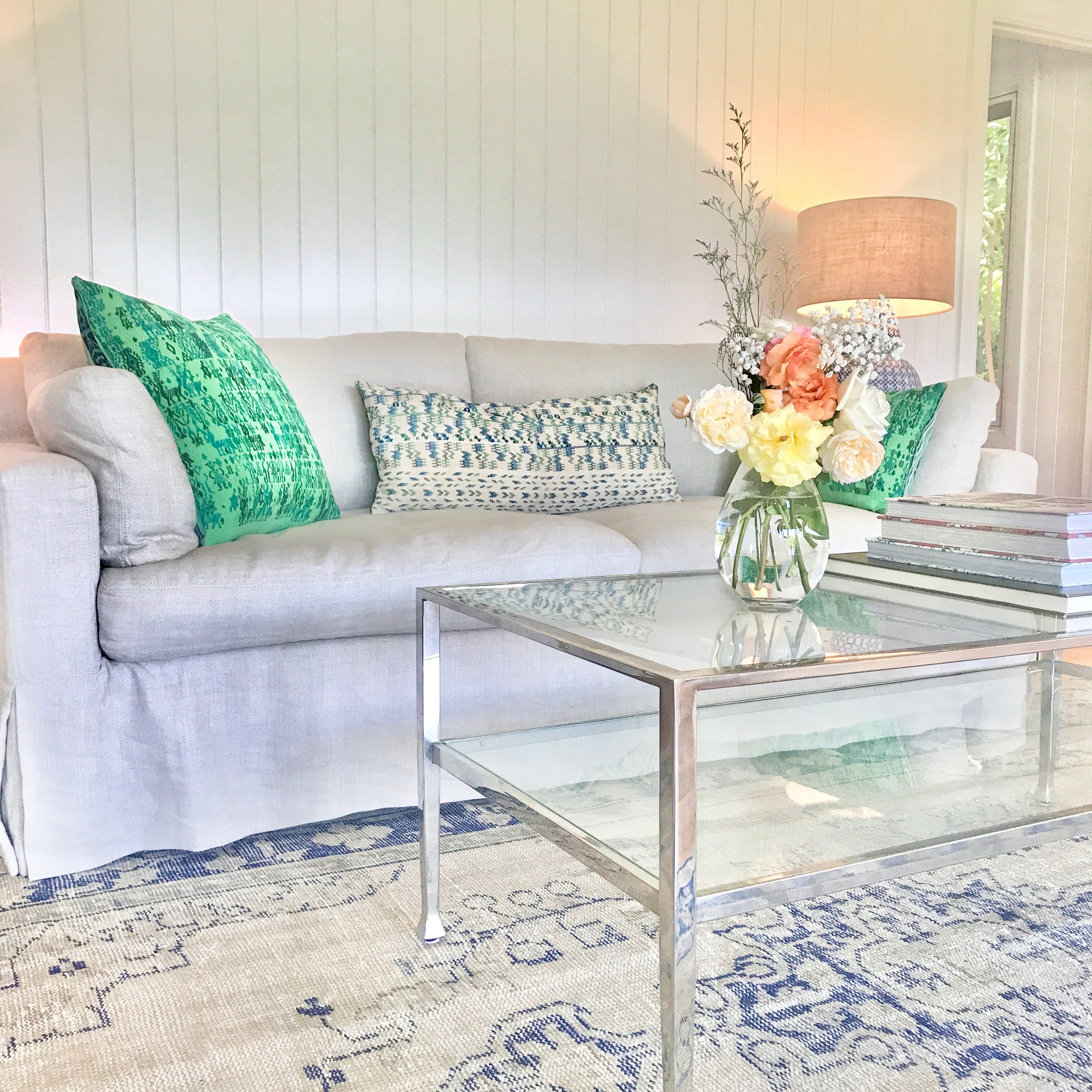 Vintage textile cushion made from a Guatemalan huipil and corte