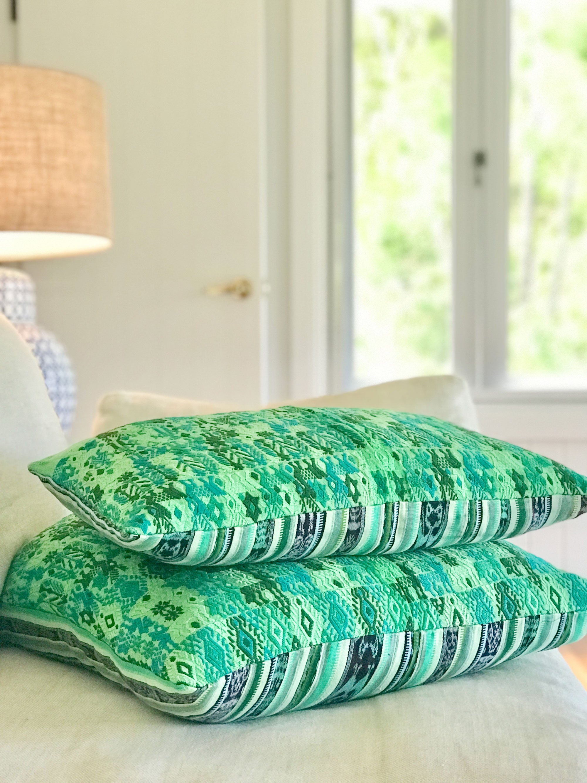 Vintage textile cushion made from a Guatemalan huipil and corte