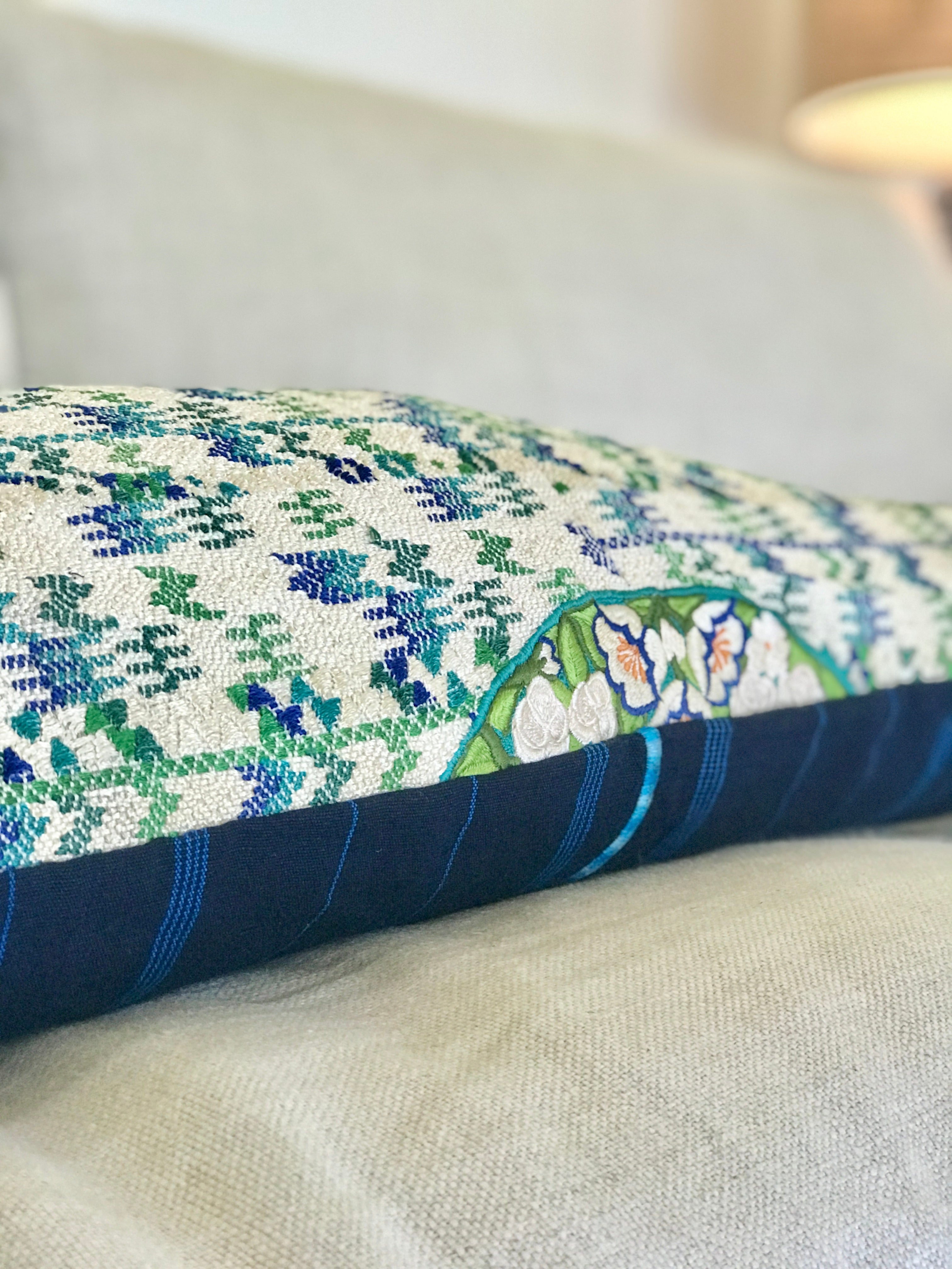 Vintage textile cushion made from a Guatemalan huipil and corte