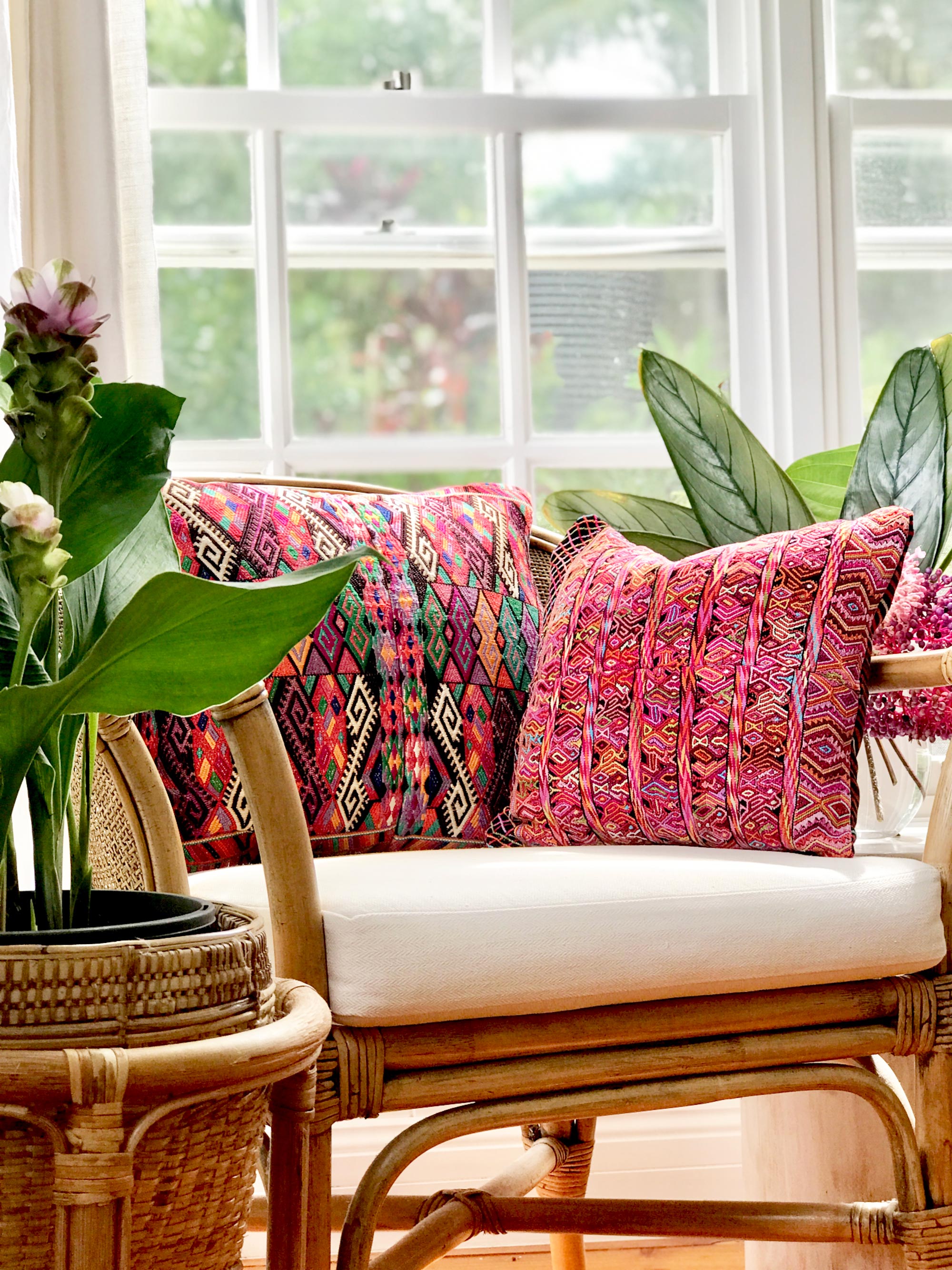 Vintage textile cushion made from a Guatemalan huipil and corte