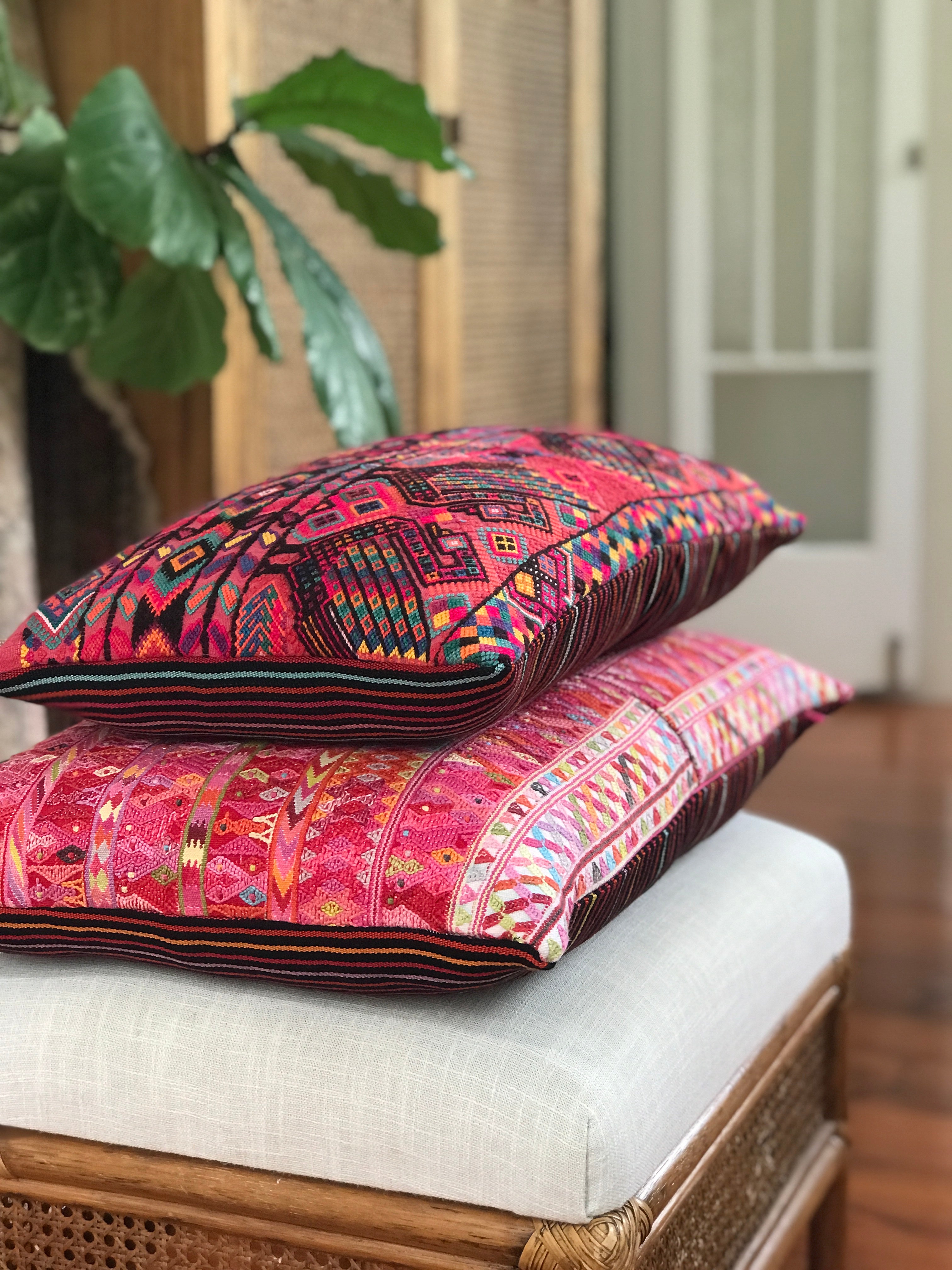 Vintage textile cushion made from a Guatemalan huipil and corte