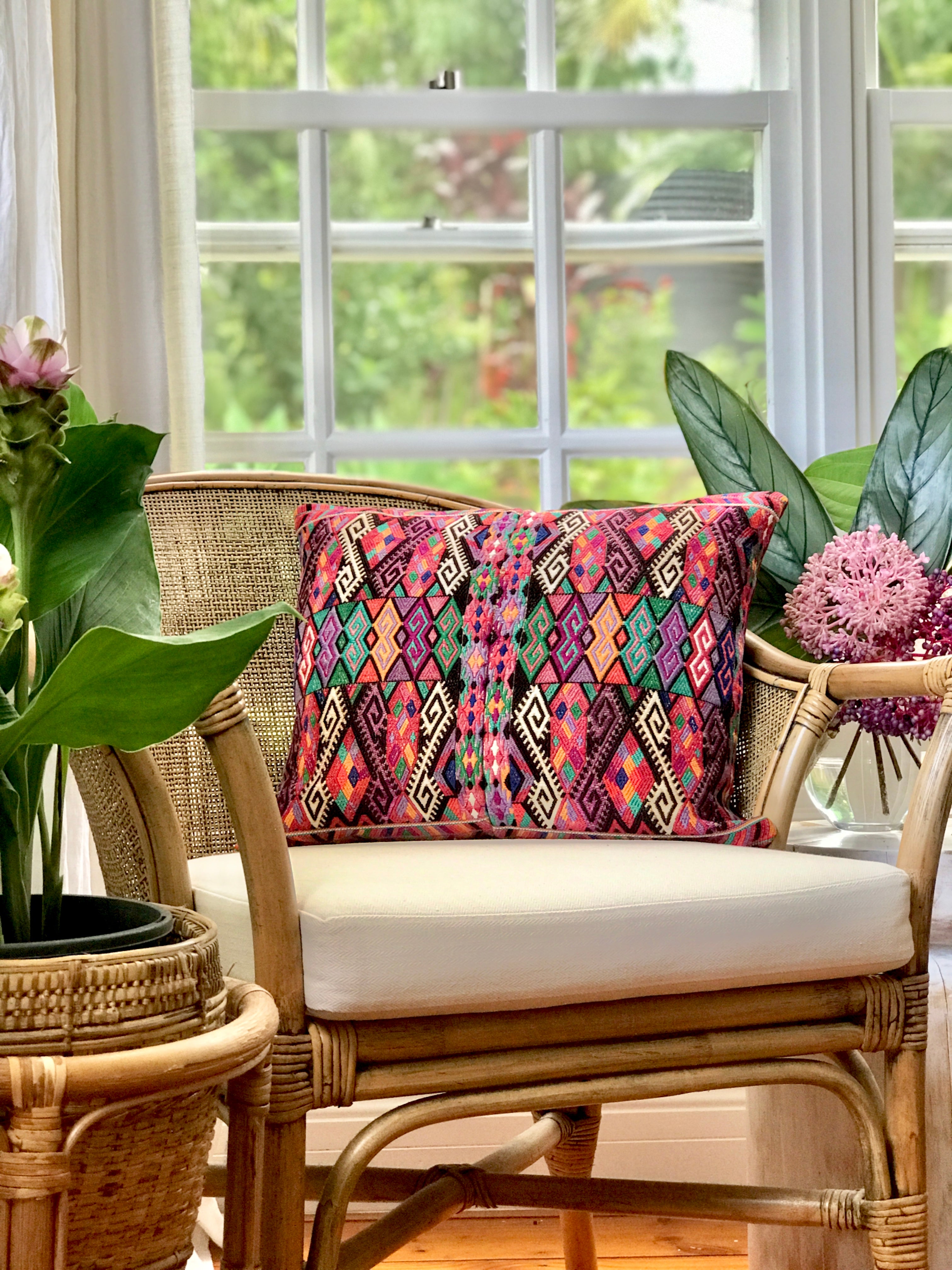 Bright pink vintage textile cushion