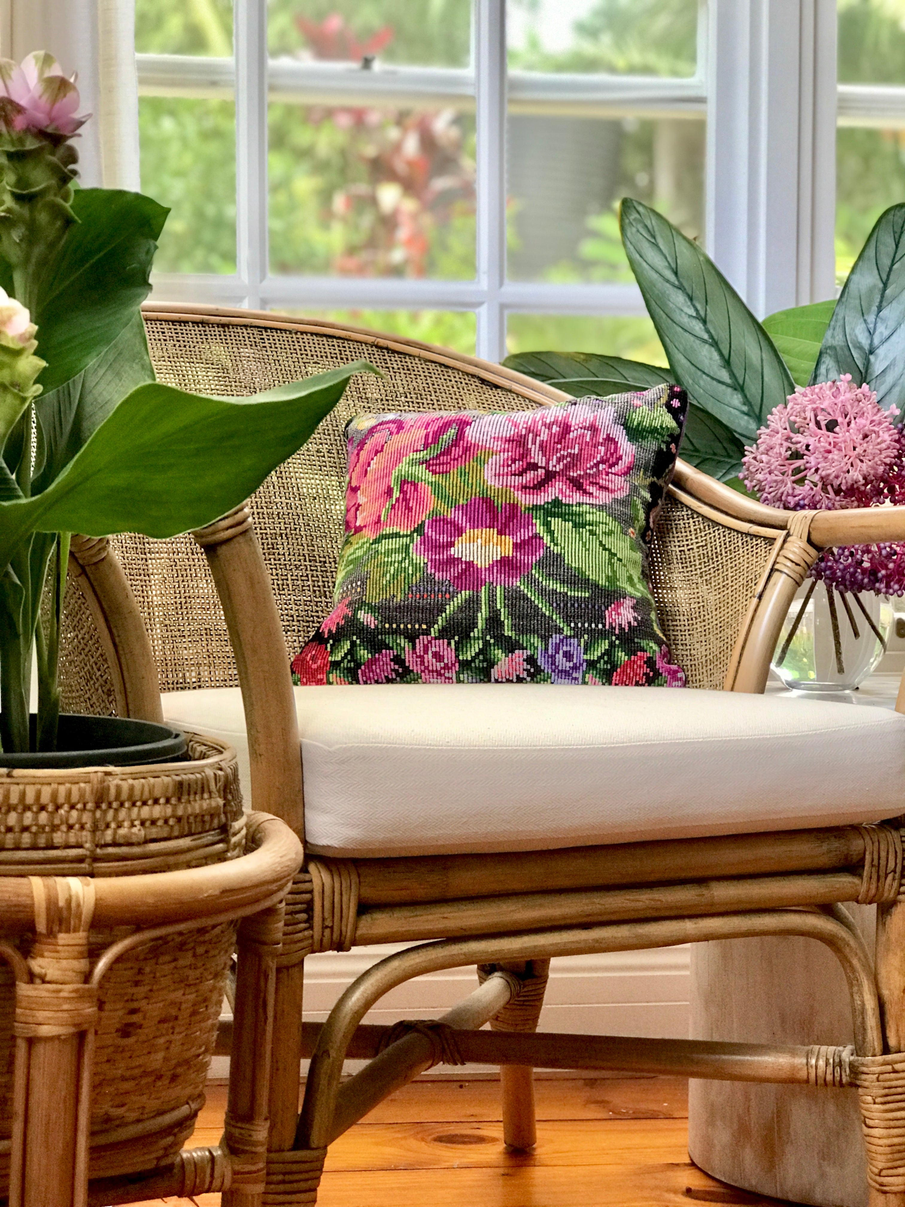 Vintage textile cushion made from a Guatemalan huipil and corte