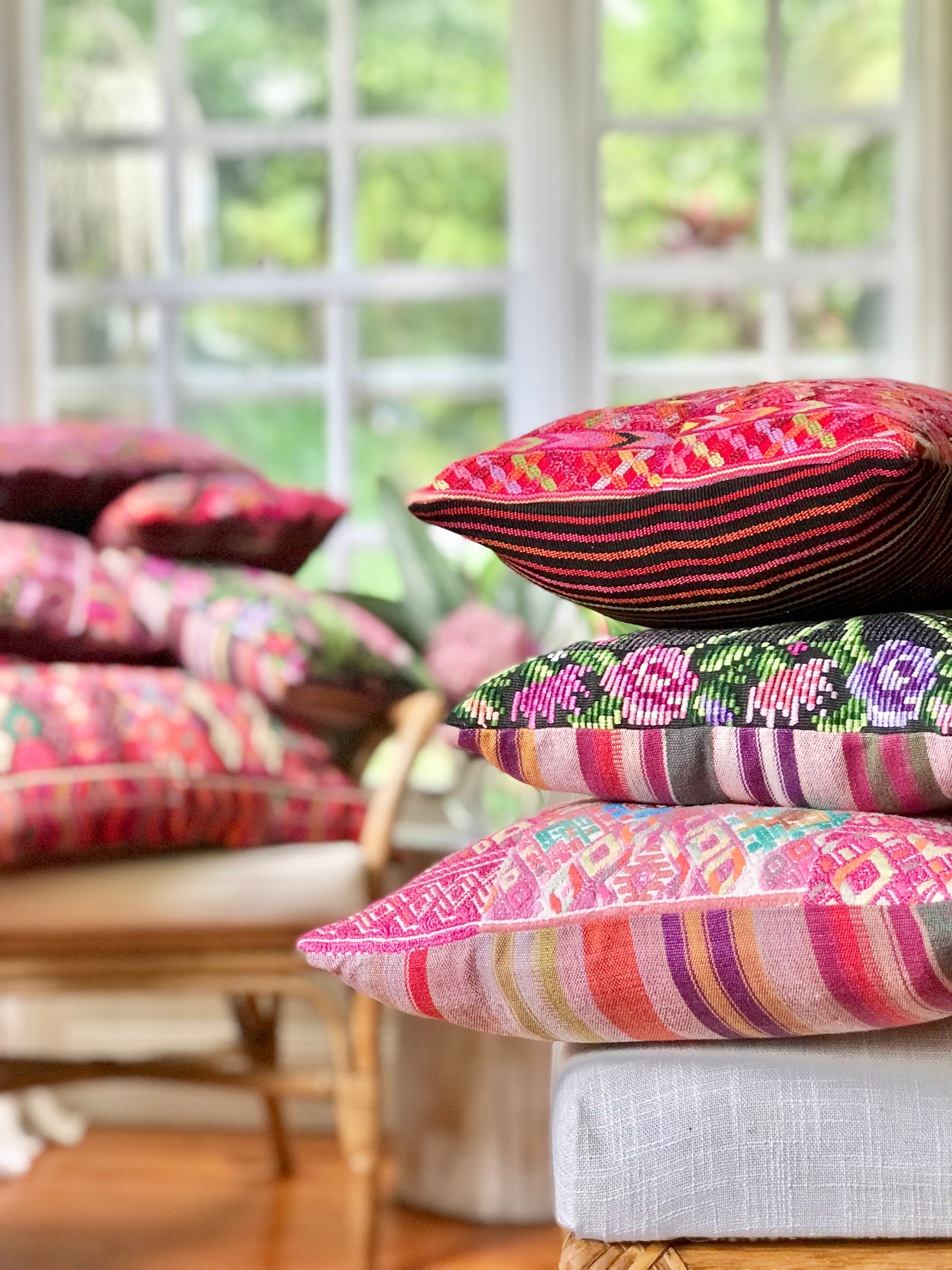 Vintage textile cushion made from a Guatemalan huipil and corte