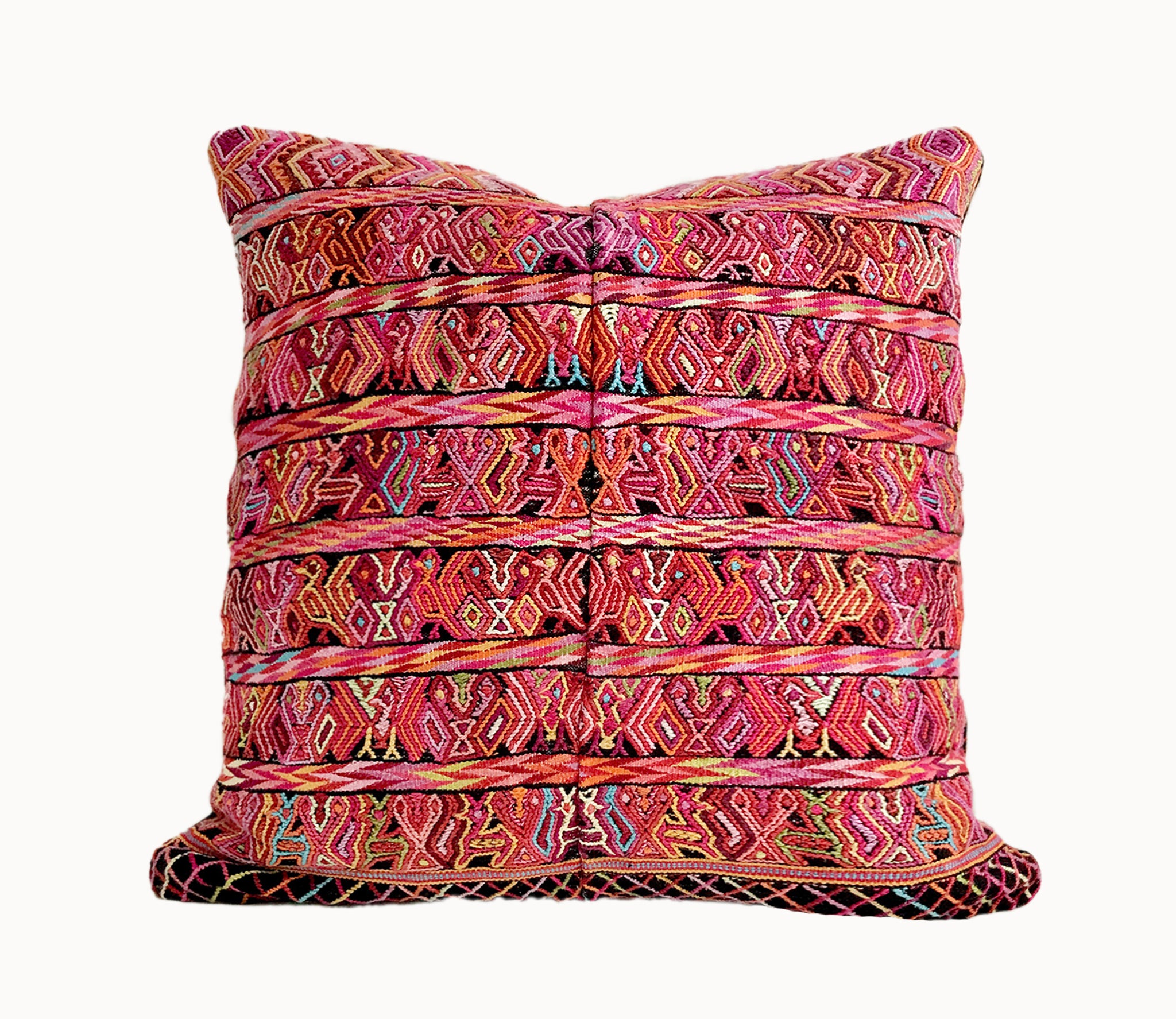 Vintage textile cushion made from a Guatemalan huipil and corte