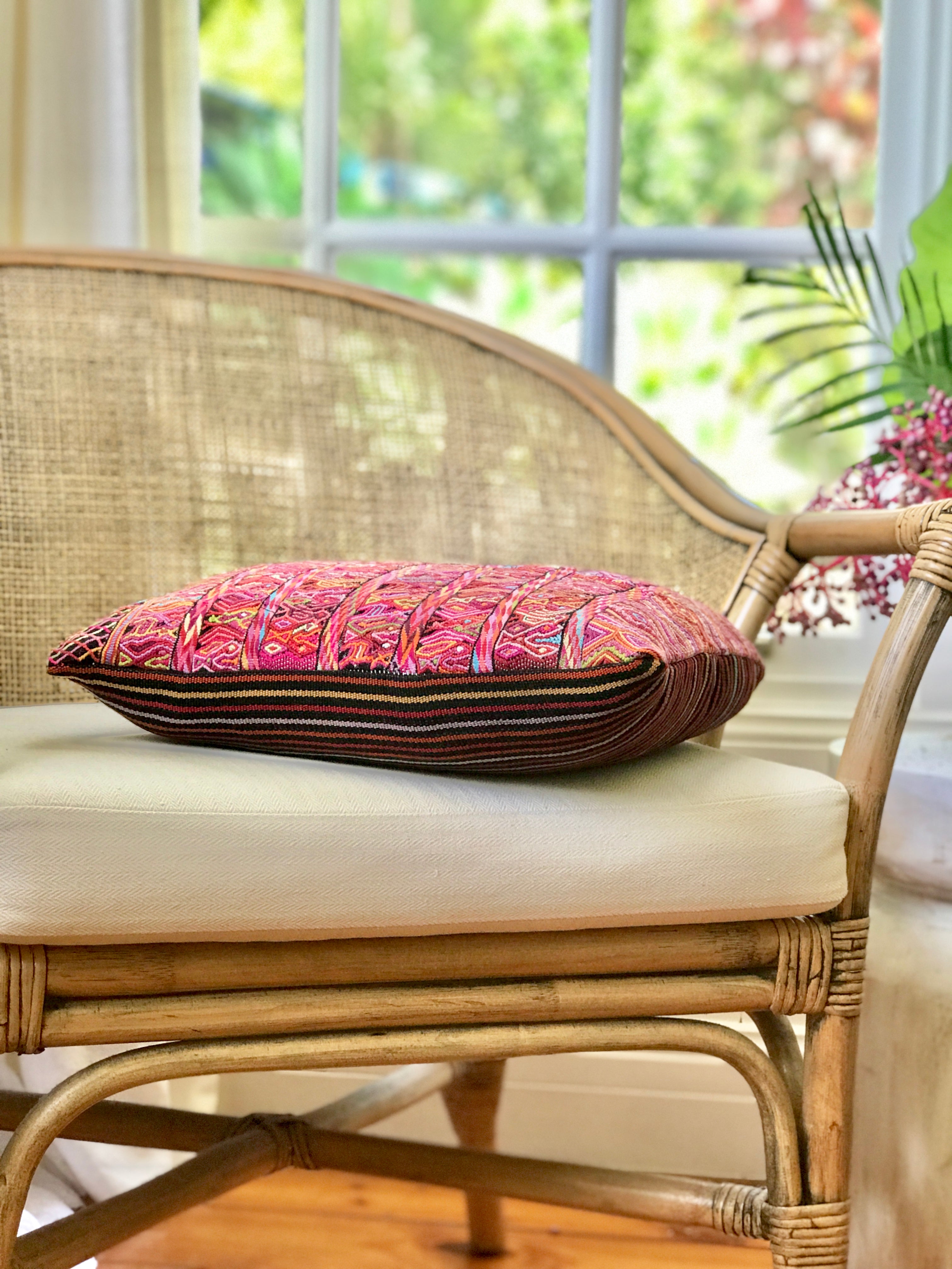 Vintage textile cushion made from a Guatemalan huipil and corte