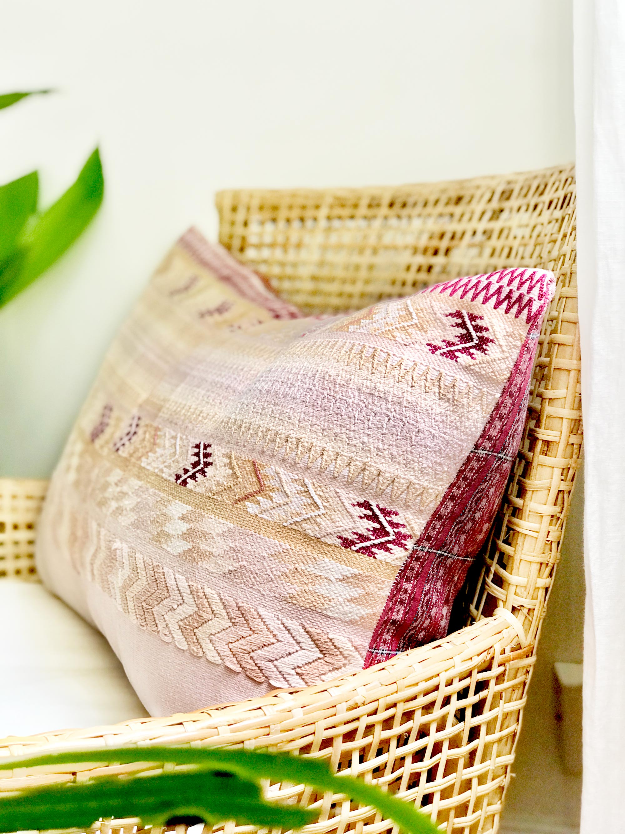 Vintage textile cushion made from a Guatemalan huipil and corte