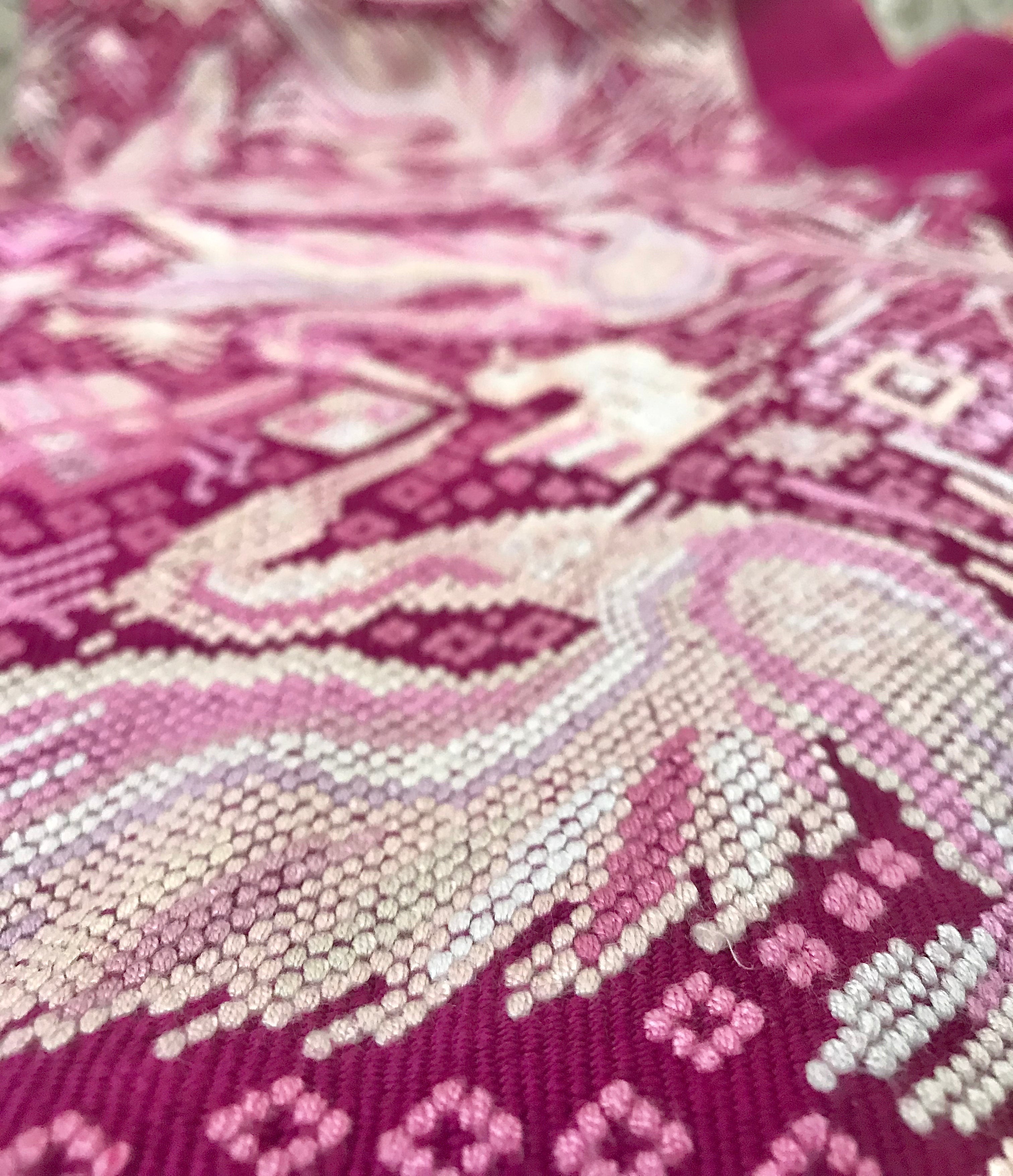 Guatemalan huipil pillow. A fuchsia vintage textile with a chinoiserie style bird design.