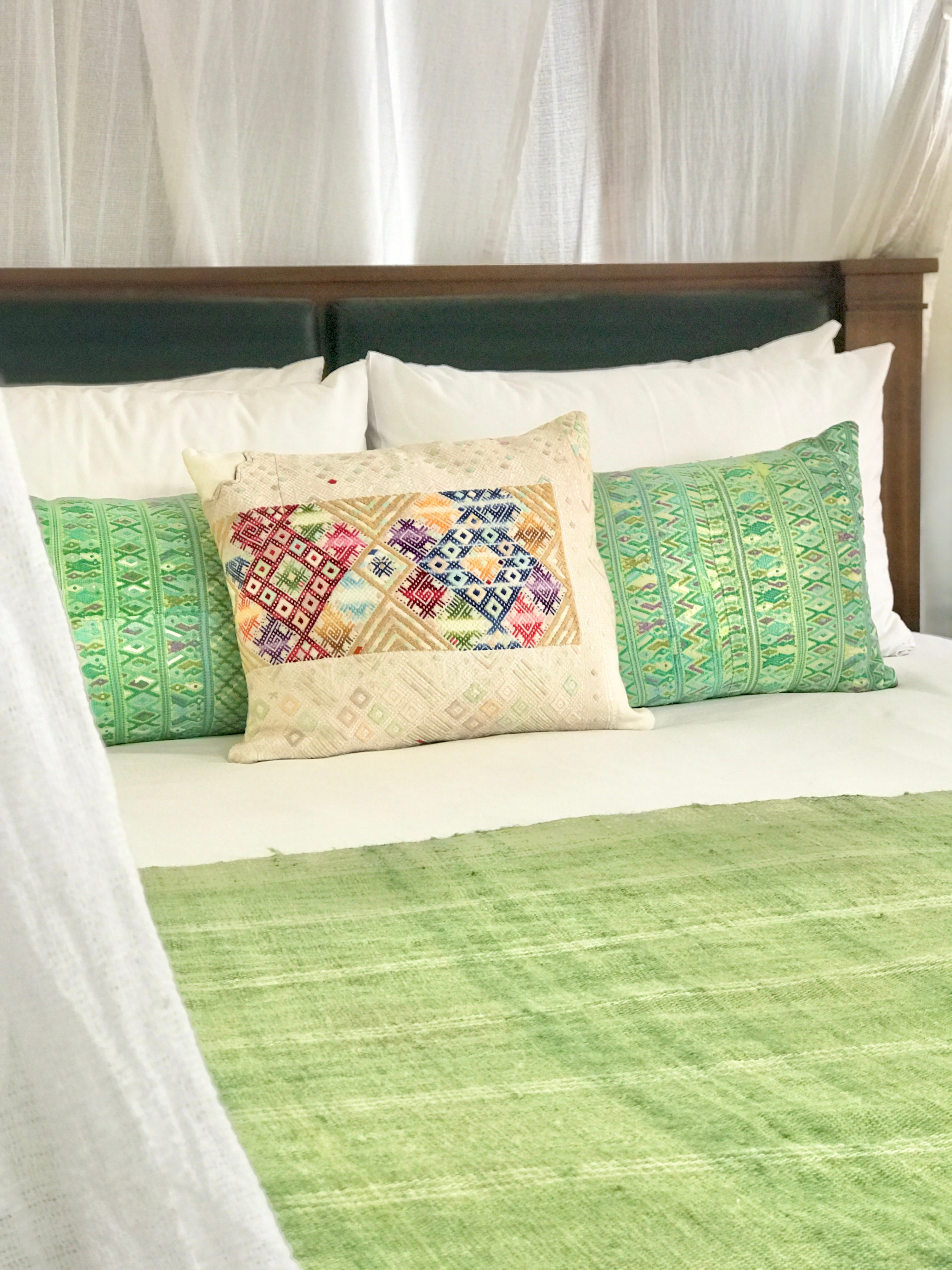 Vintage textile huipil cushion