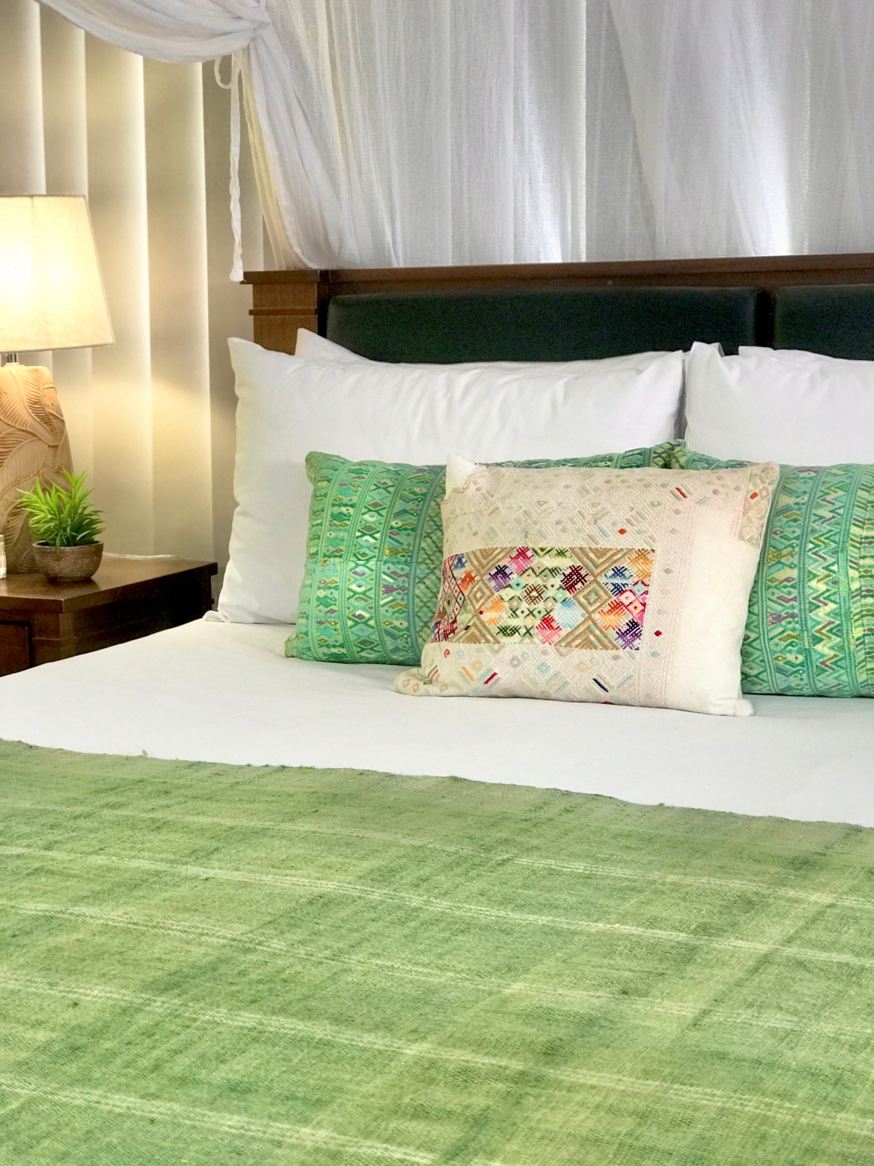 Vintage textile huipil cushion