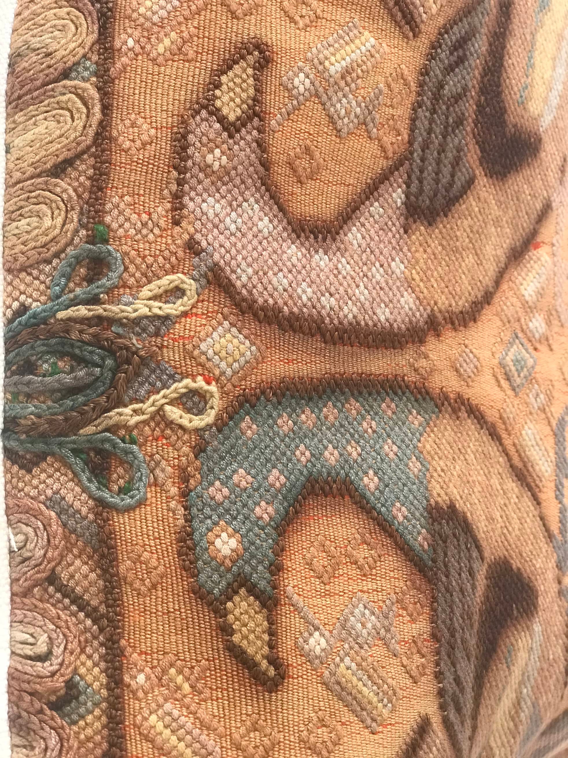 Guatemalan embroidered huipil pillow. Exotic yellow peacock birds in a maximalist bohemian design