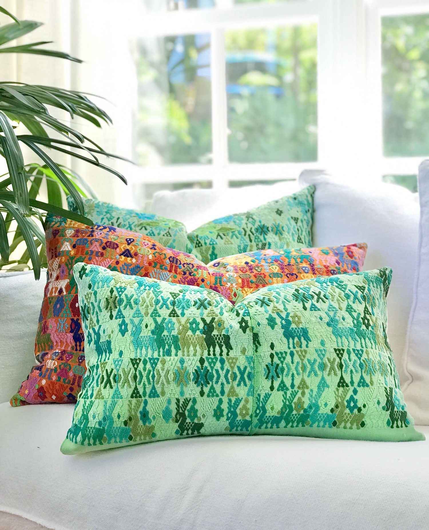 Guatemalan embroidered huipil pillow. Tribal symbols for bohemian decor.