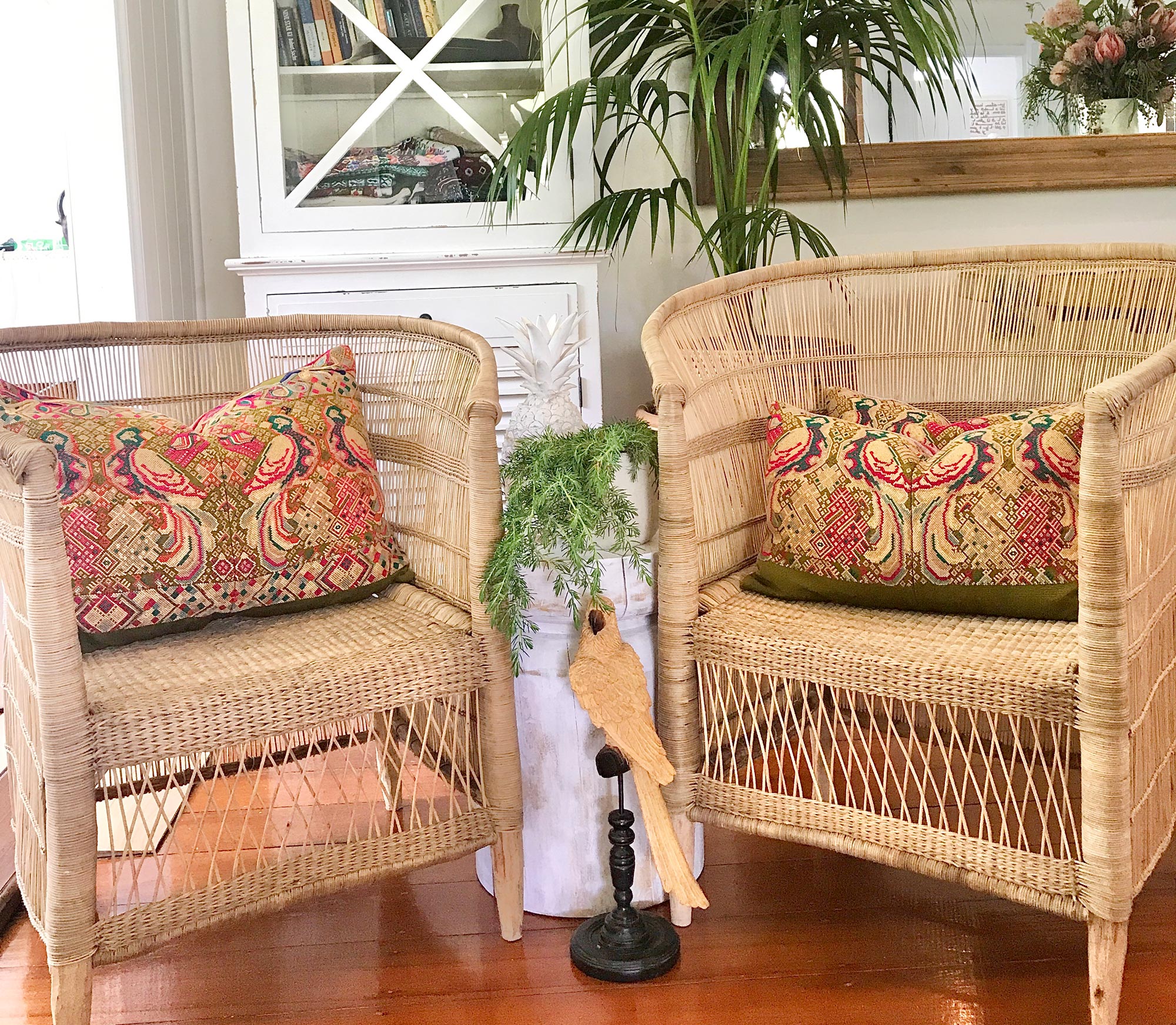 Vintage textile pillows made from a Guatemalan huipil and corte.